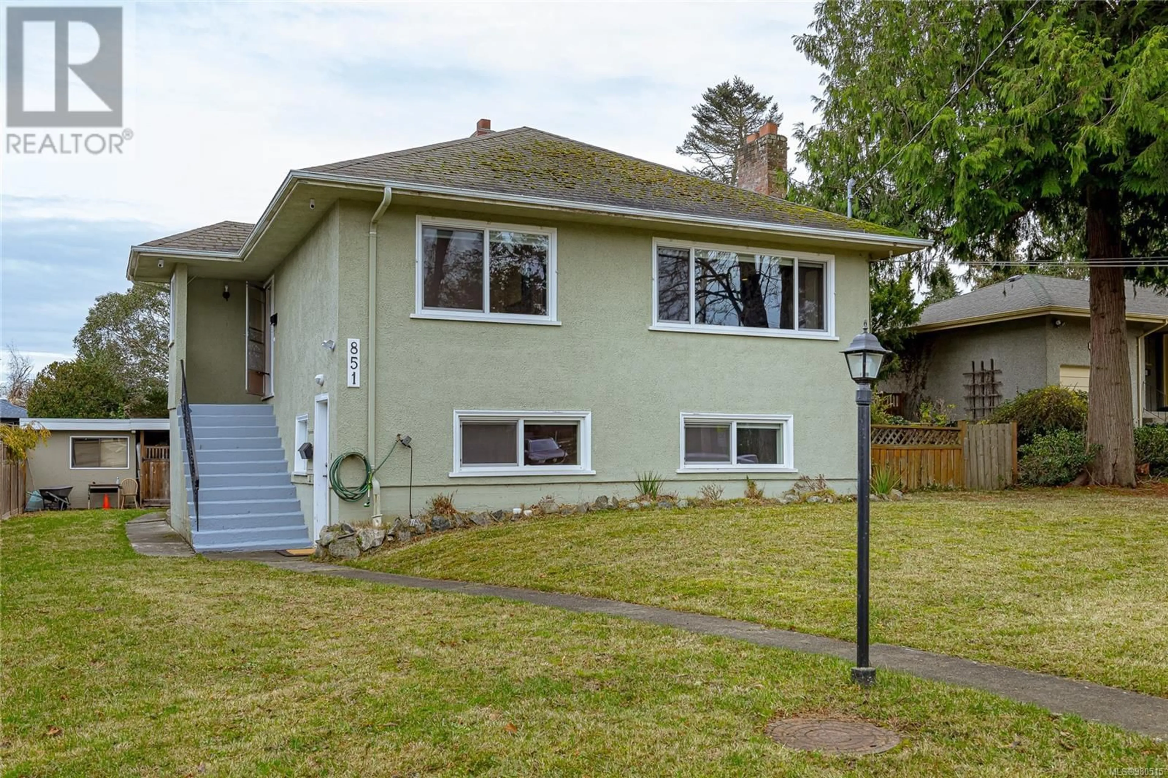 Frontside or backside of a home, the fenced backyard for 851 Maddison St, Victoria British Columbia V8S4C3