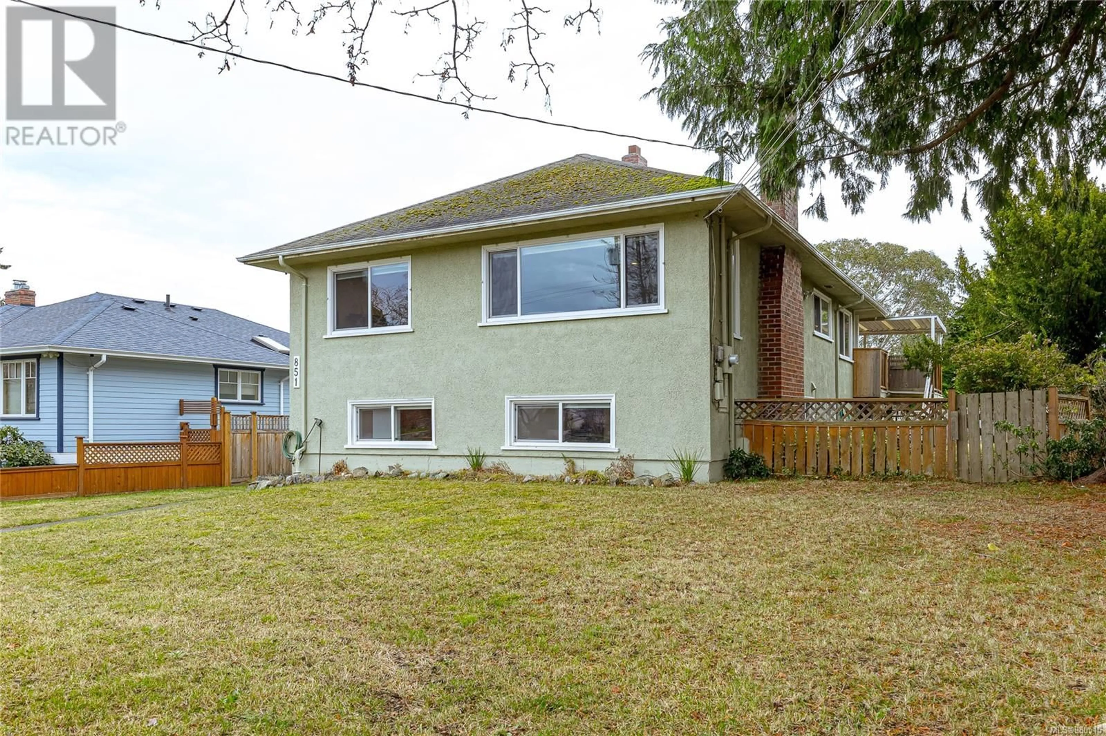 Frontside or backside of a home, the fenced backyard for 851 Maddison St, Victoria British Columbia V8S4C3