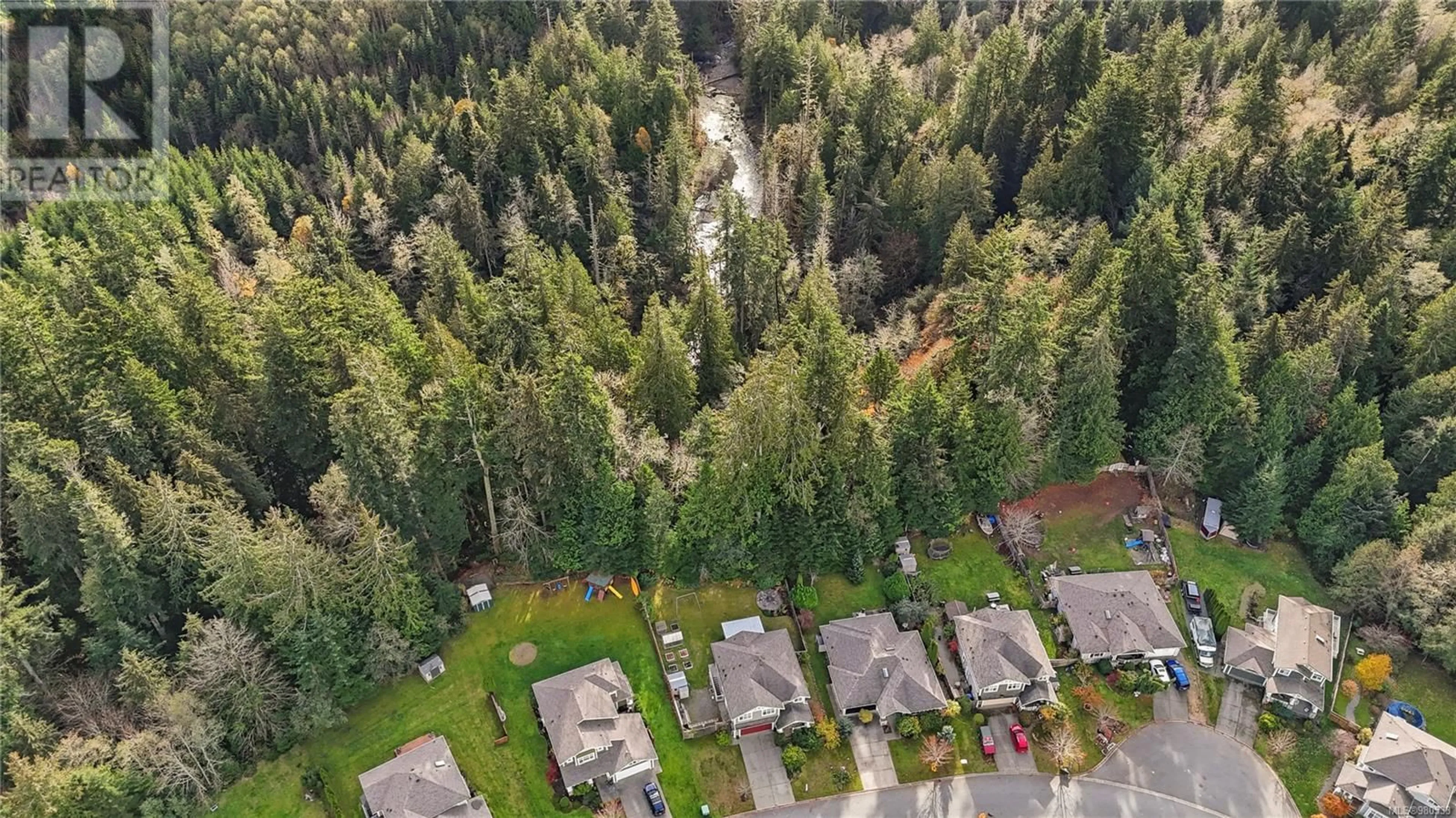 A pic from exterior of the house or condo, the fenced backyard for 6507 Stonewood Dr, Sooke British Columbia V9Z0Y6