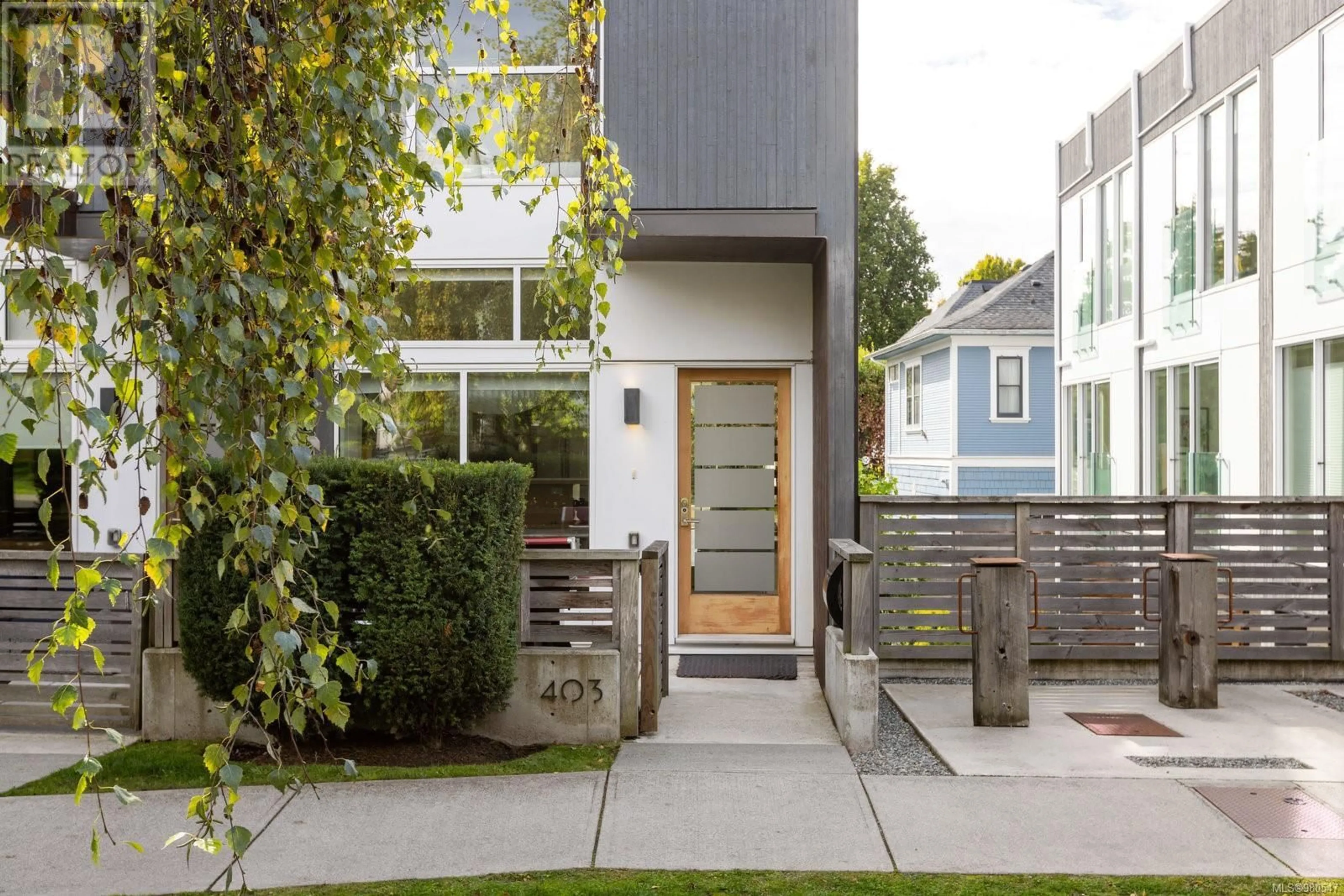 Frontside or backside of a home, the fenced backyard for 403 Kingston St, Victoria British Columbia V8V1V8