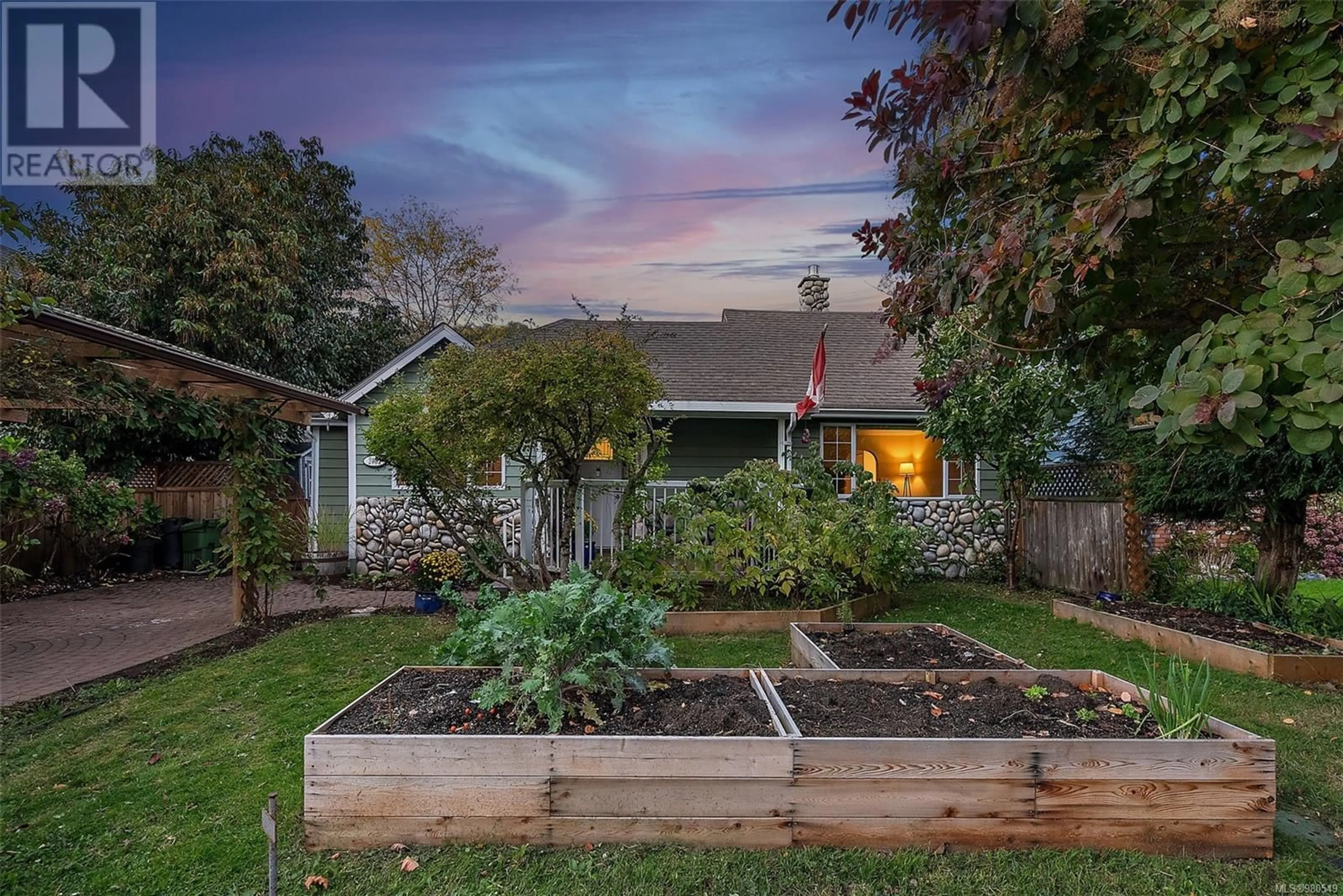 Frontside or backside of a home, the fenced backyard for 2432 Amherst Ave, Sidney British Columbia V8L3B6