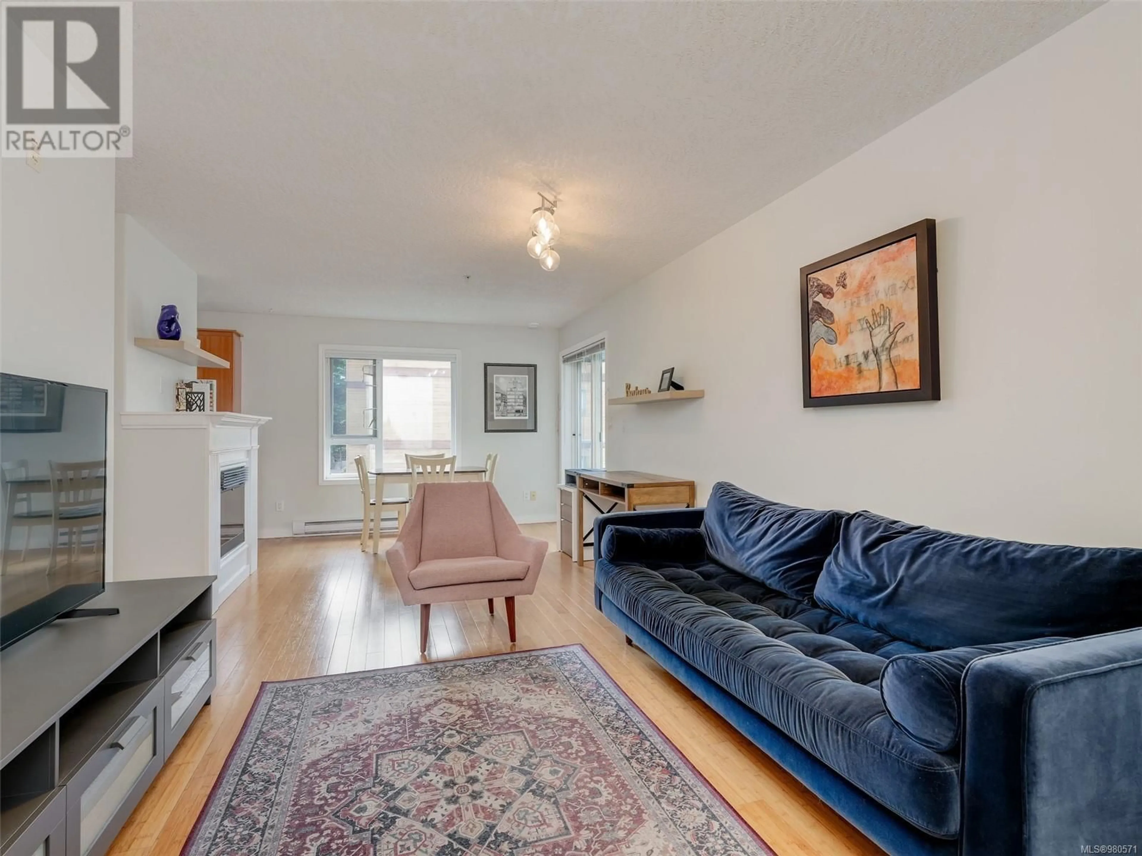 Living room, wood floors for 403 885 Ellery St, Esquimalt British Columbia V9A4R8