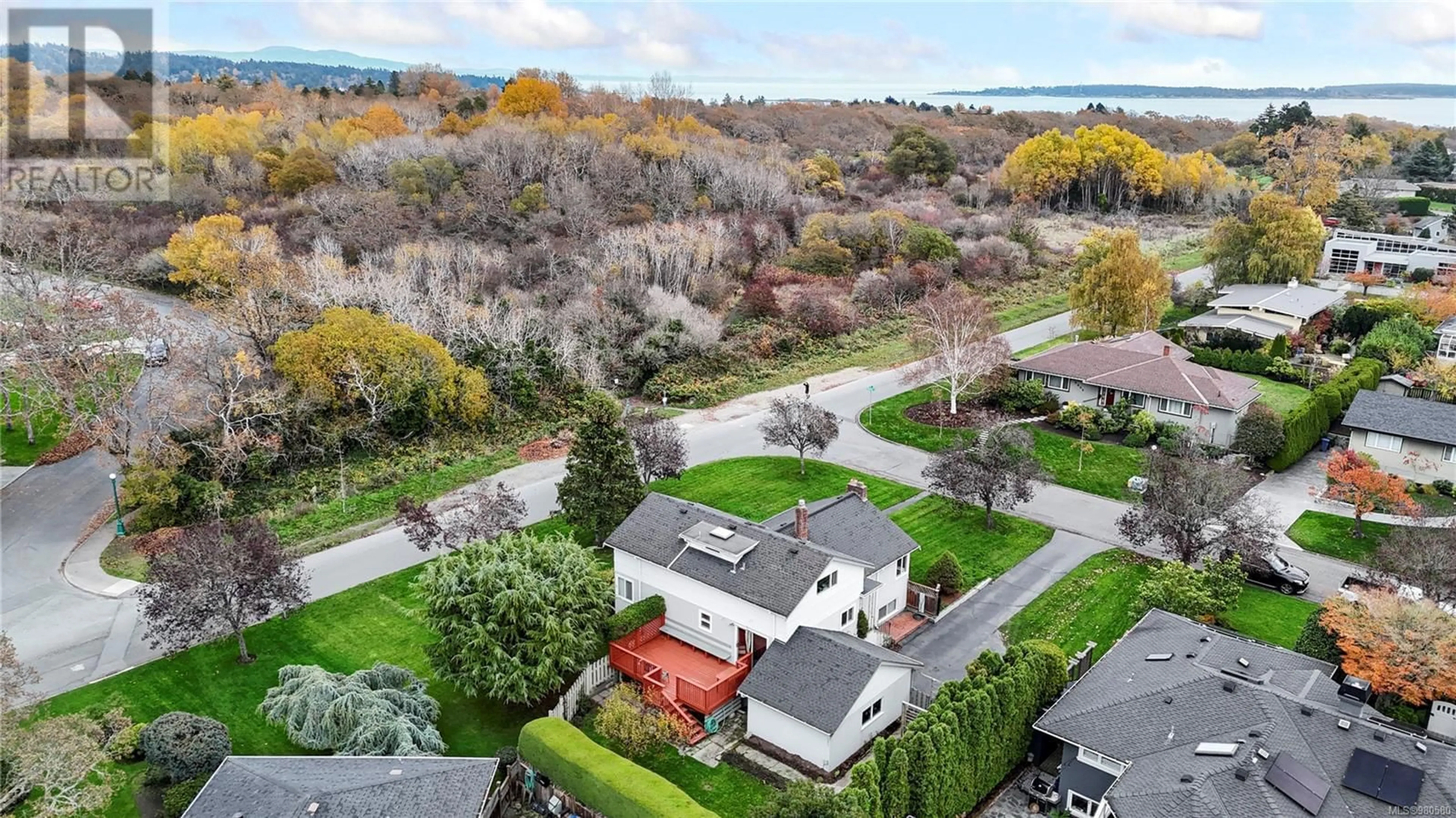 A pic from exterior of the house or condo, the fenced backyard for 2830 Dunlevy St, Oak Bay British Columbia V8R5Z5