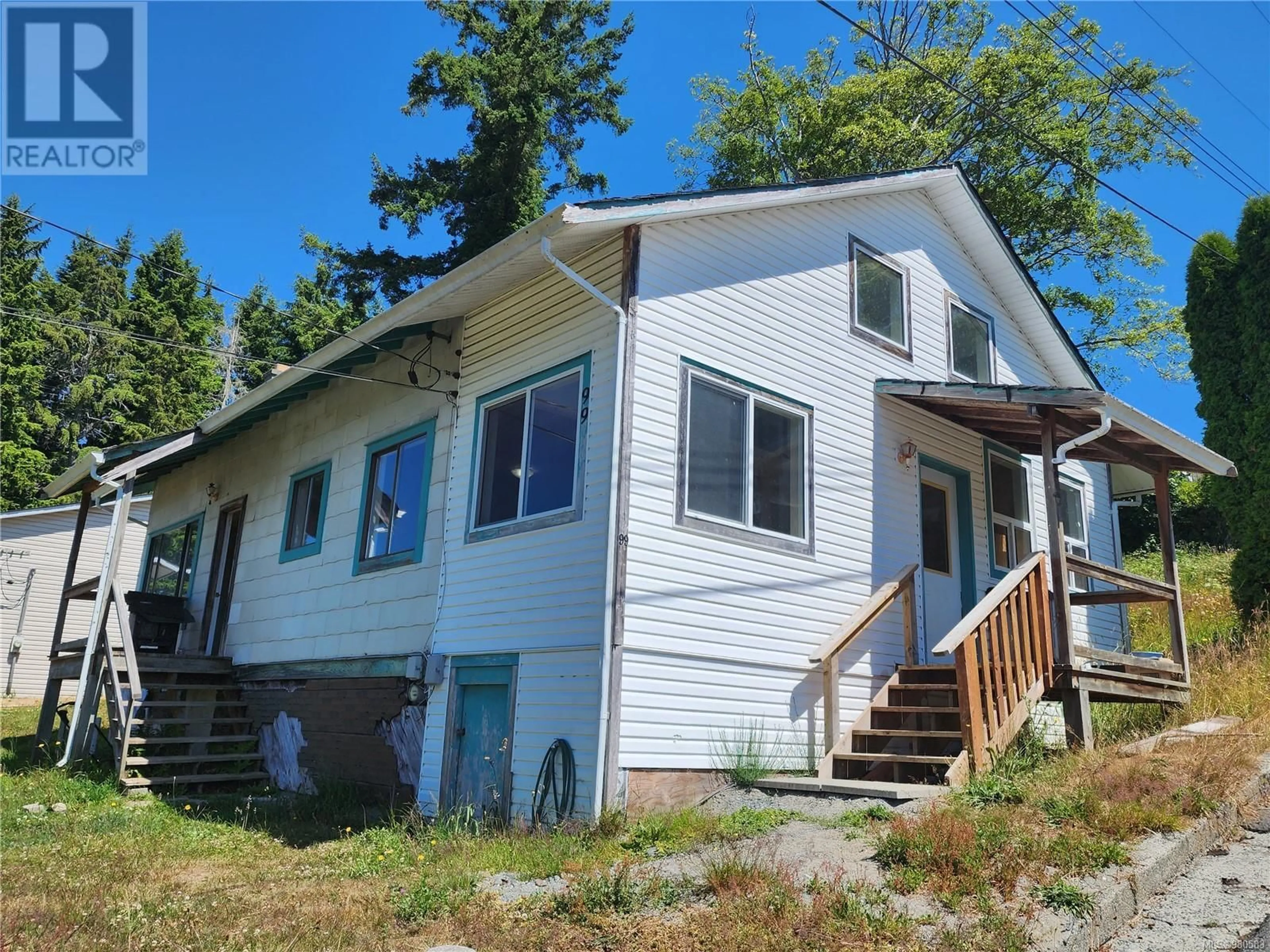 Frontside or backside of a home, cottage for 99 HEMLOCK St, Alert Bay British Columbia V0N1A0