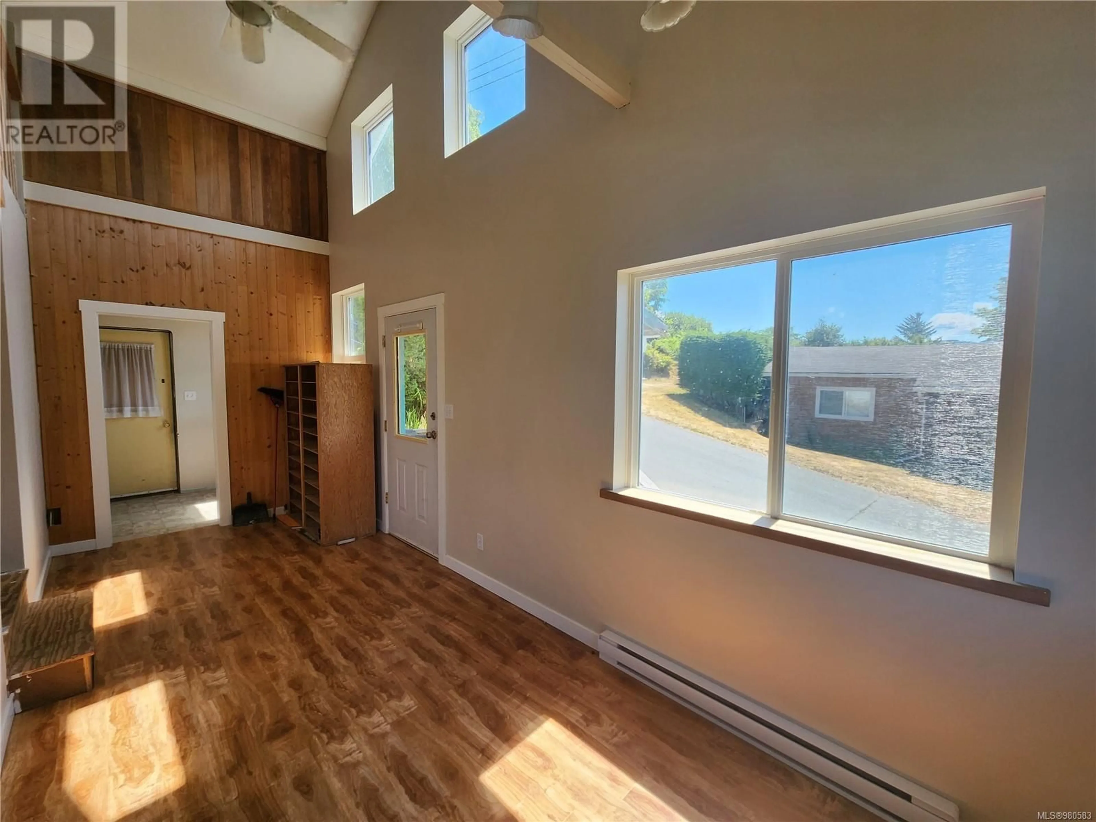 A pic of a room, wood floors for 99 HEMLOCK St, Alert Bay British Columbia V0N1A0