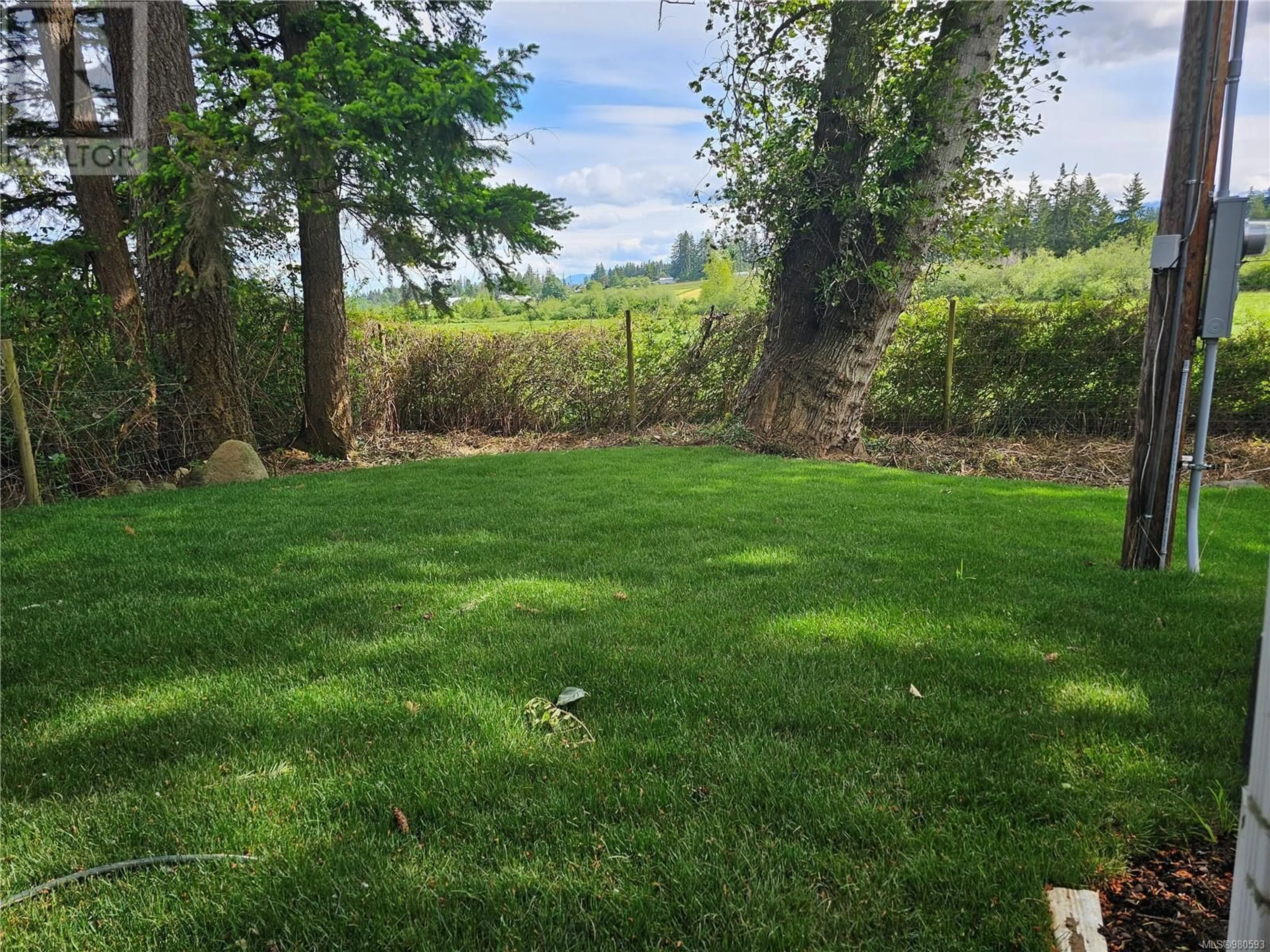 Patio, the fenced backyard for 8 980 Anderton Rd, Comox British Columbia V9M4A4