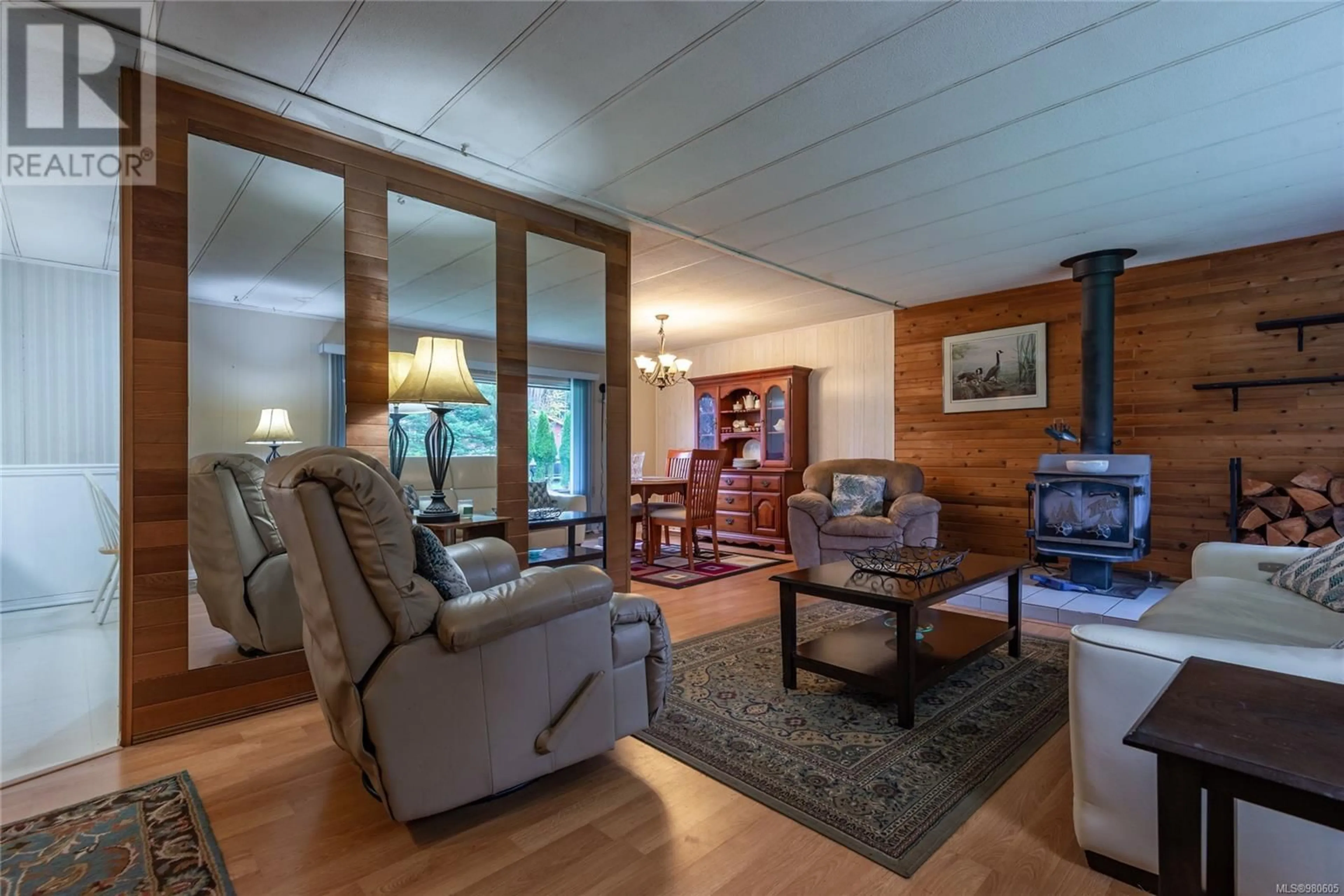 Living room, wood floors for 2571 Spring Rd, Campbell River British Columbia V9W4V8