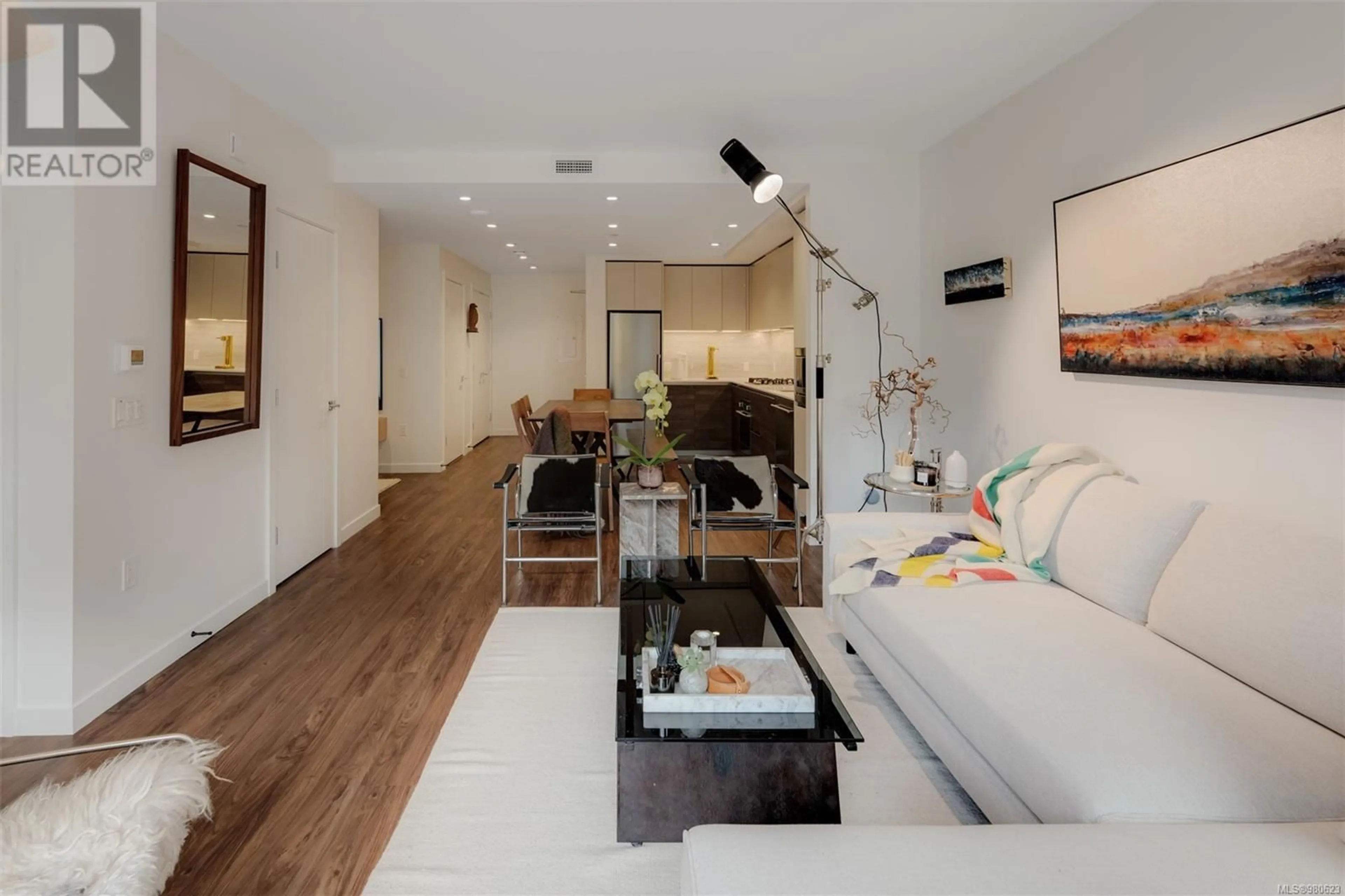 Living room, wood floors for 103 363 Tyee Rd, Victoria British Columbia V9A0B5