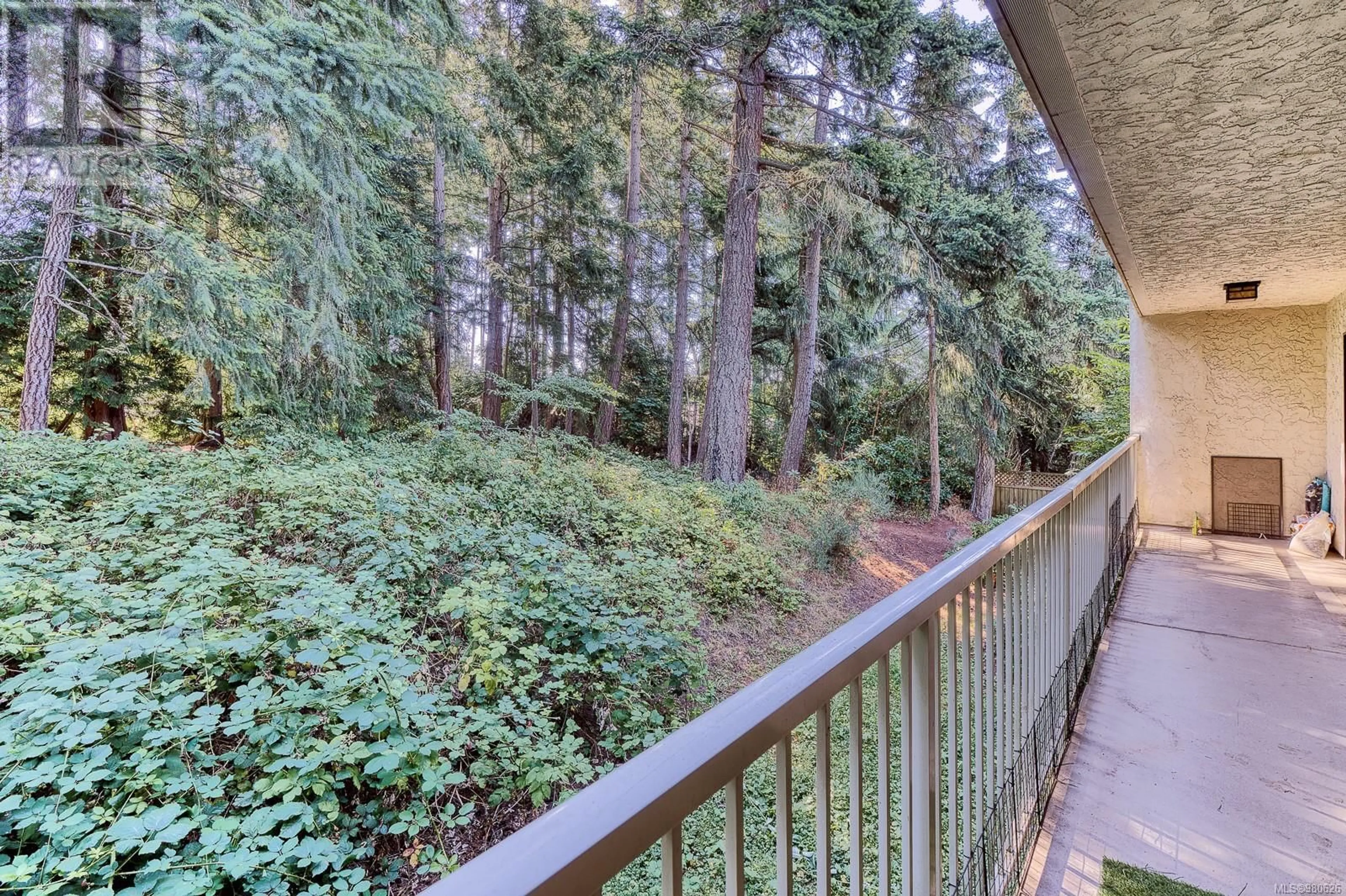 Patio, the fenced backyard for 203 4720 Uplands Dr, Nanaimo British Columbia V9T4S7