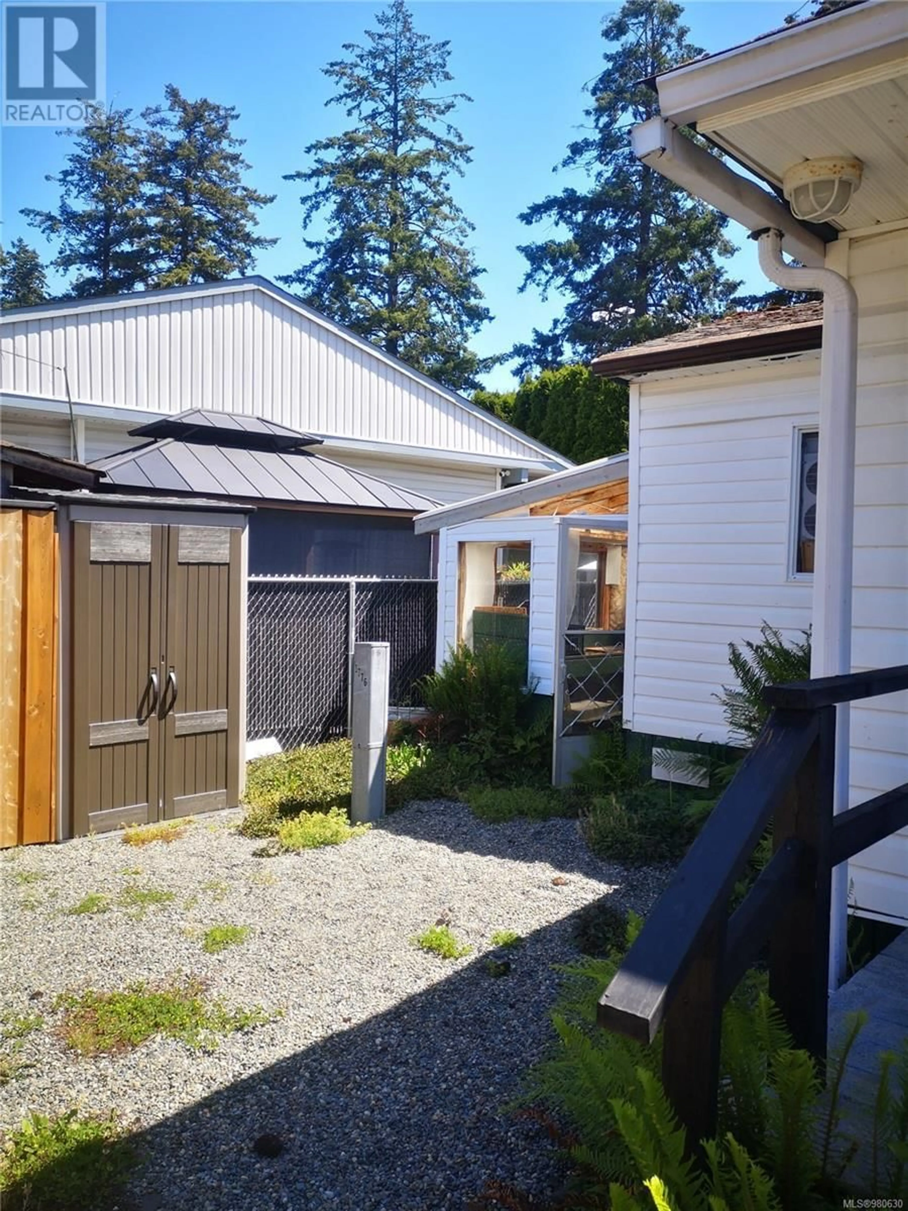 Frontside or backside of a home, the fenced backyard for 29 2911 Sooke Lake Rd, Langford British Columbia V9B4R5