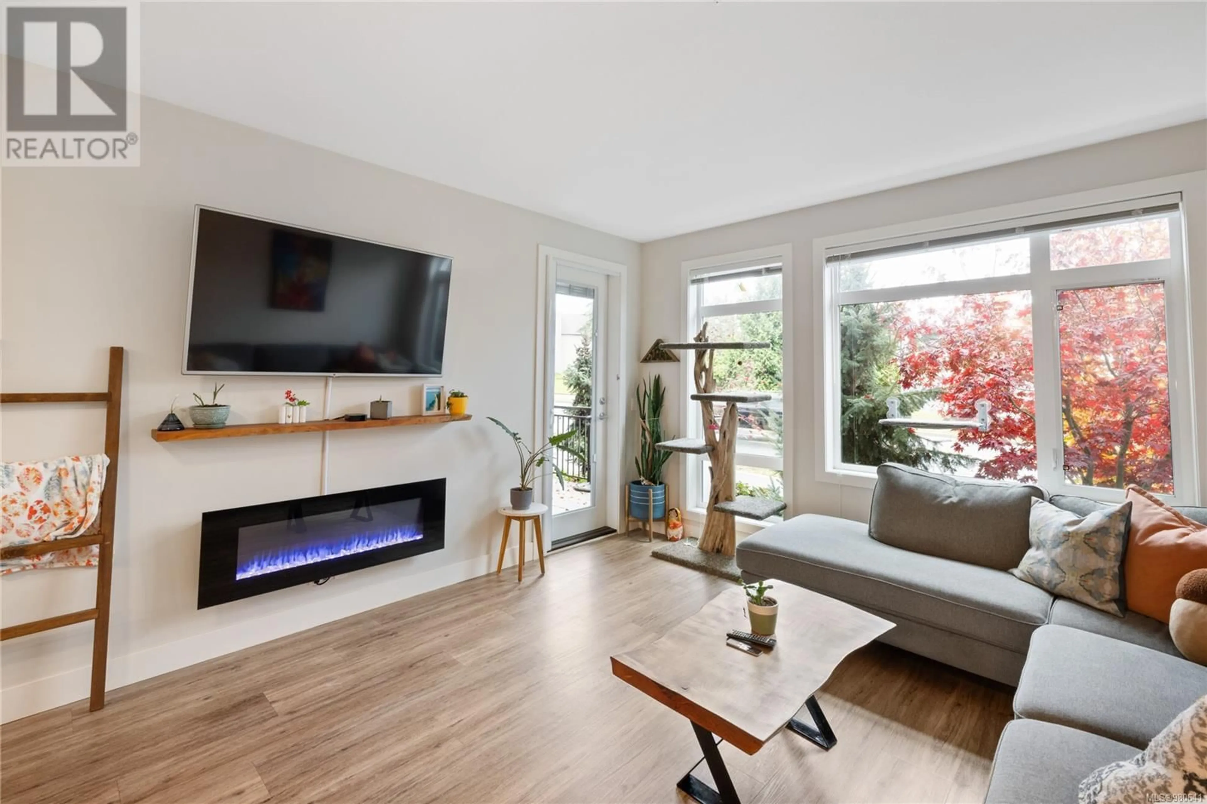 Living room, wood floors for 107 6540 Metral Dr, Nanaimo British Columbia V9T2L8