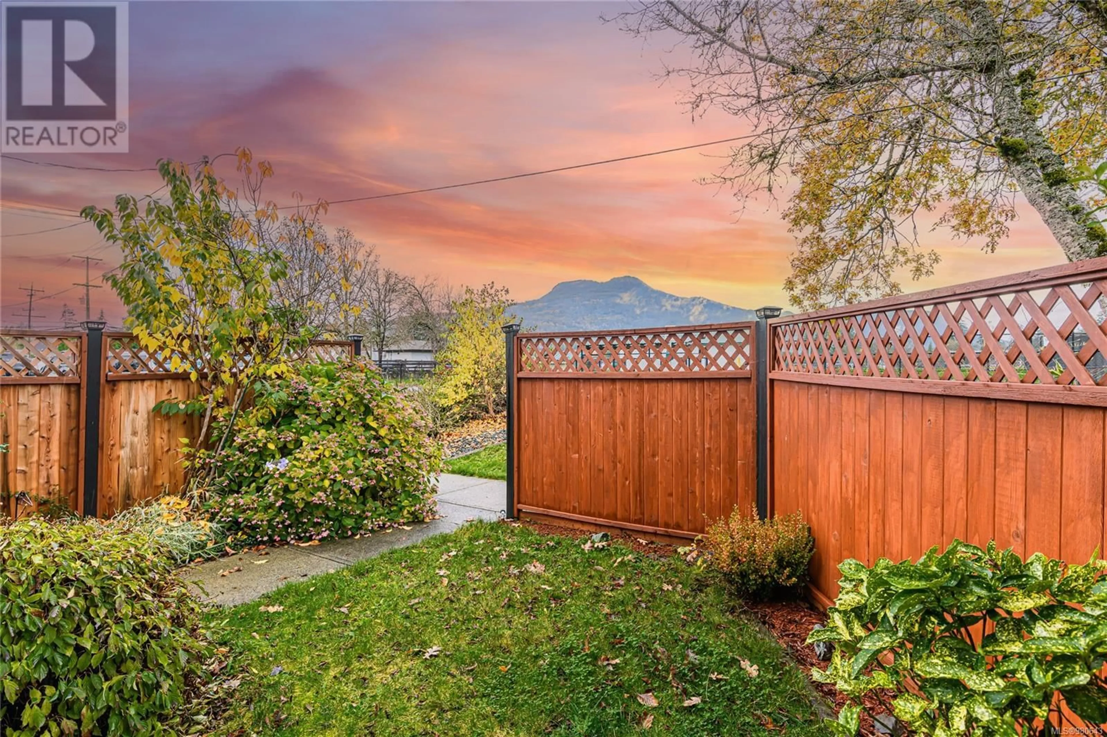 Patio, the fenced backyard for 1 3266 Auchinachie Rd, Duncan British Columbia V9L4V2