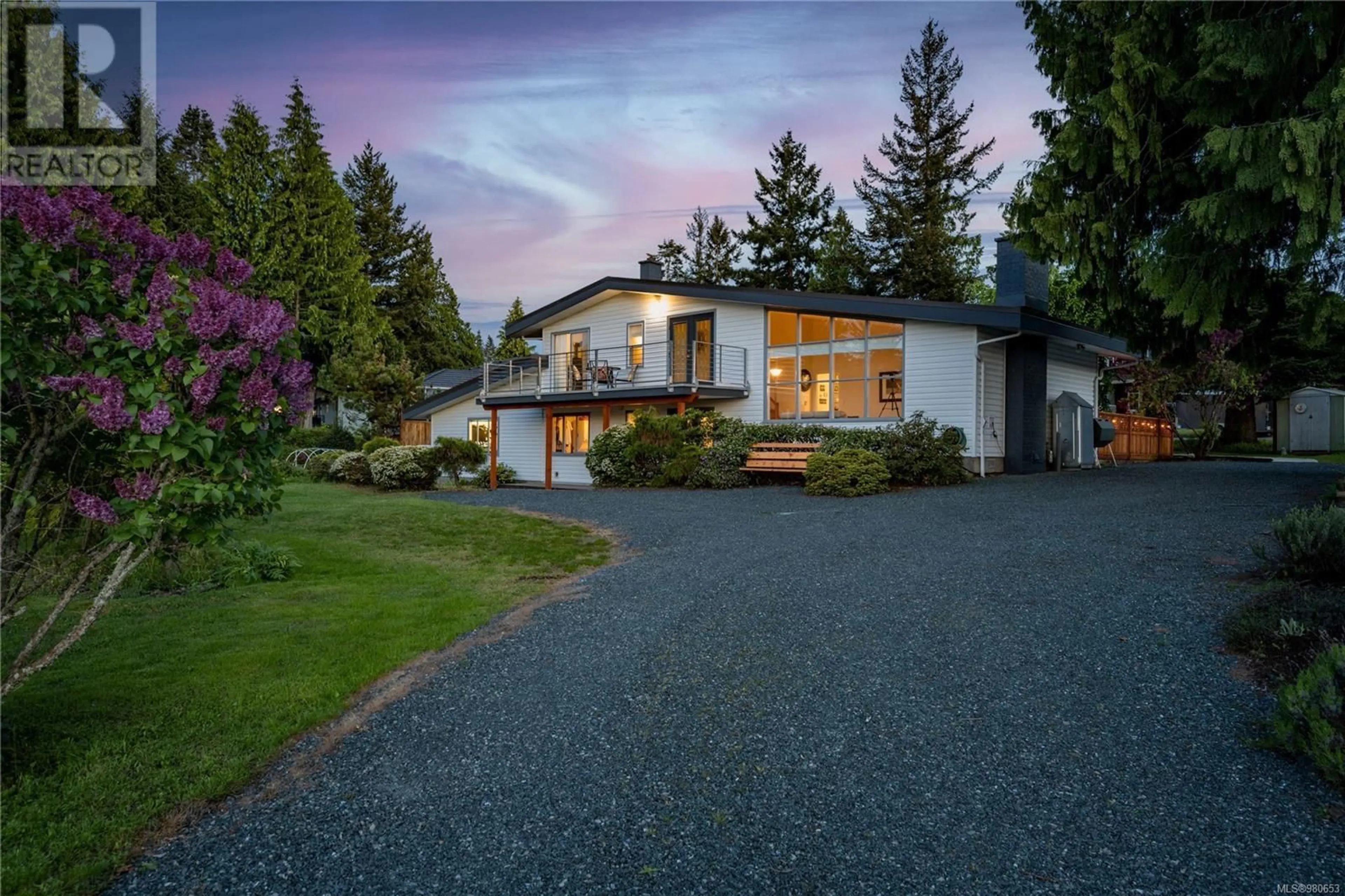 Frontside or backside of a home, cottage for 661 Belyea Rd, Qualicum Beach British Columbia V9K1H4