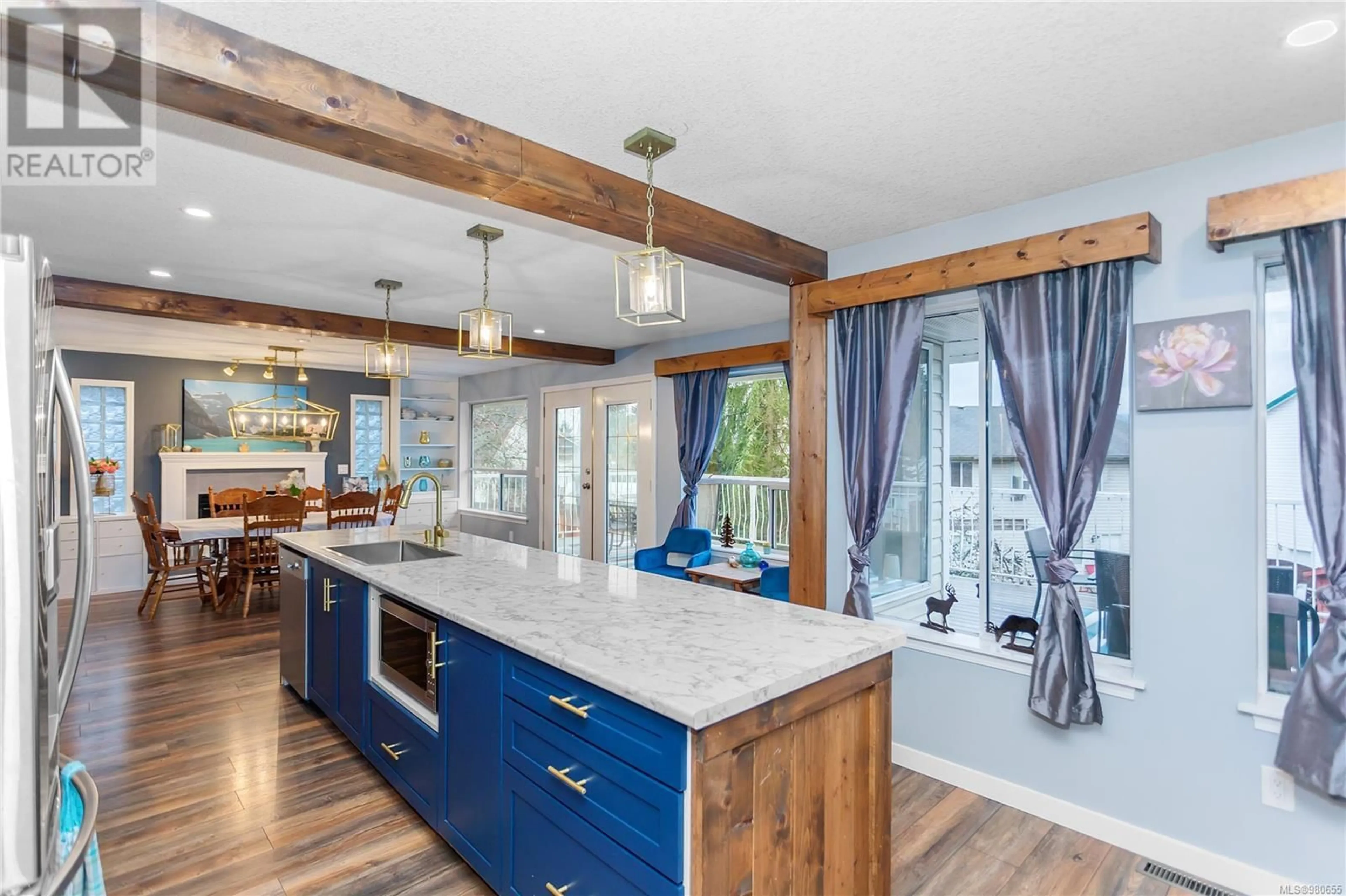 Open concept kitchen for 5106 Carol Pl, Nanaimo British Columbia V9T5Z3