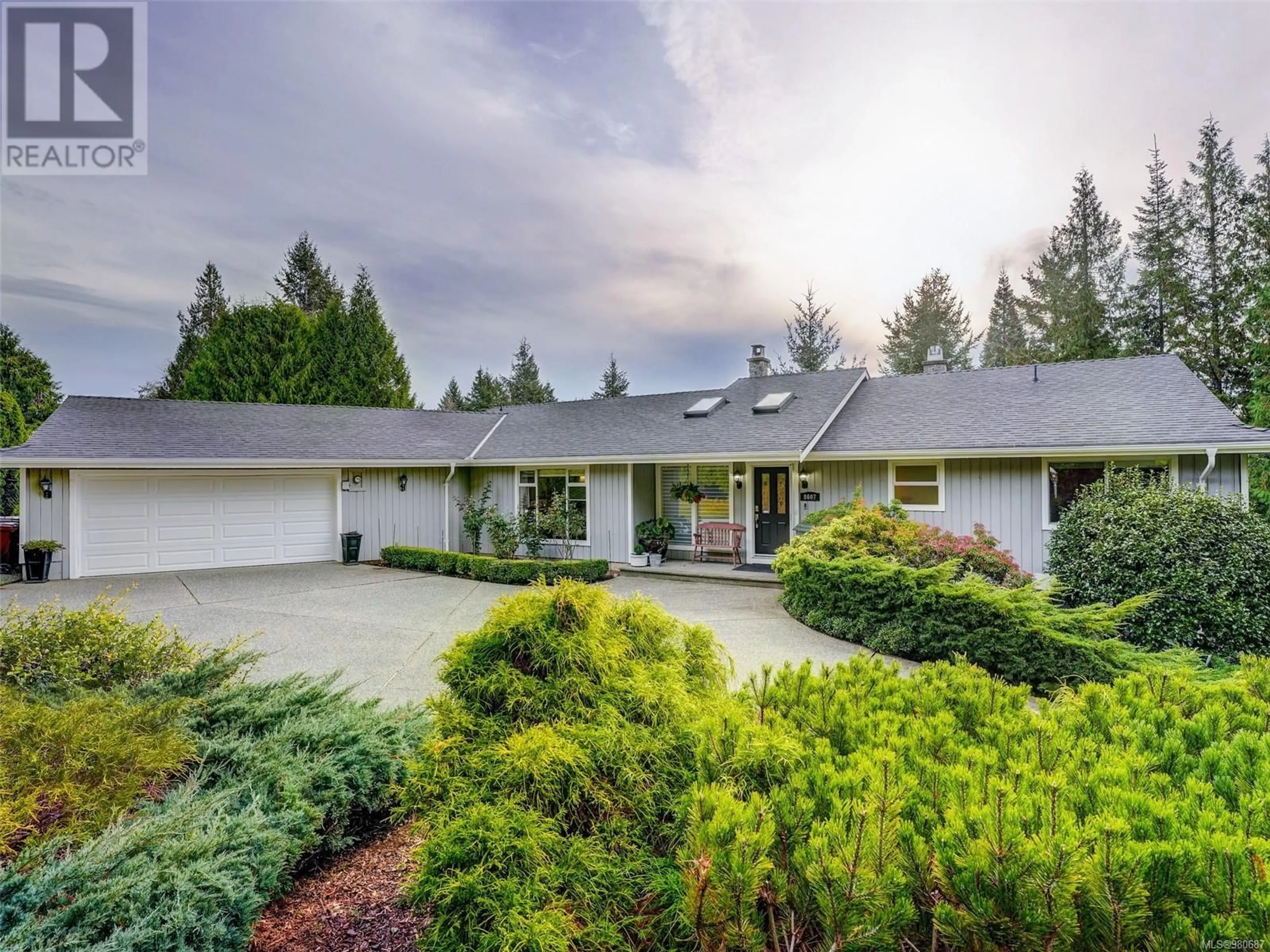 Frontside or backside of a home, cottage for 8607 Sansum Park Dr, North Saanich British Columbia V8L4W8