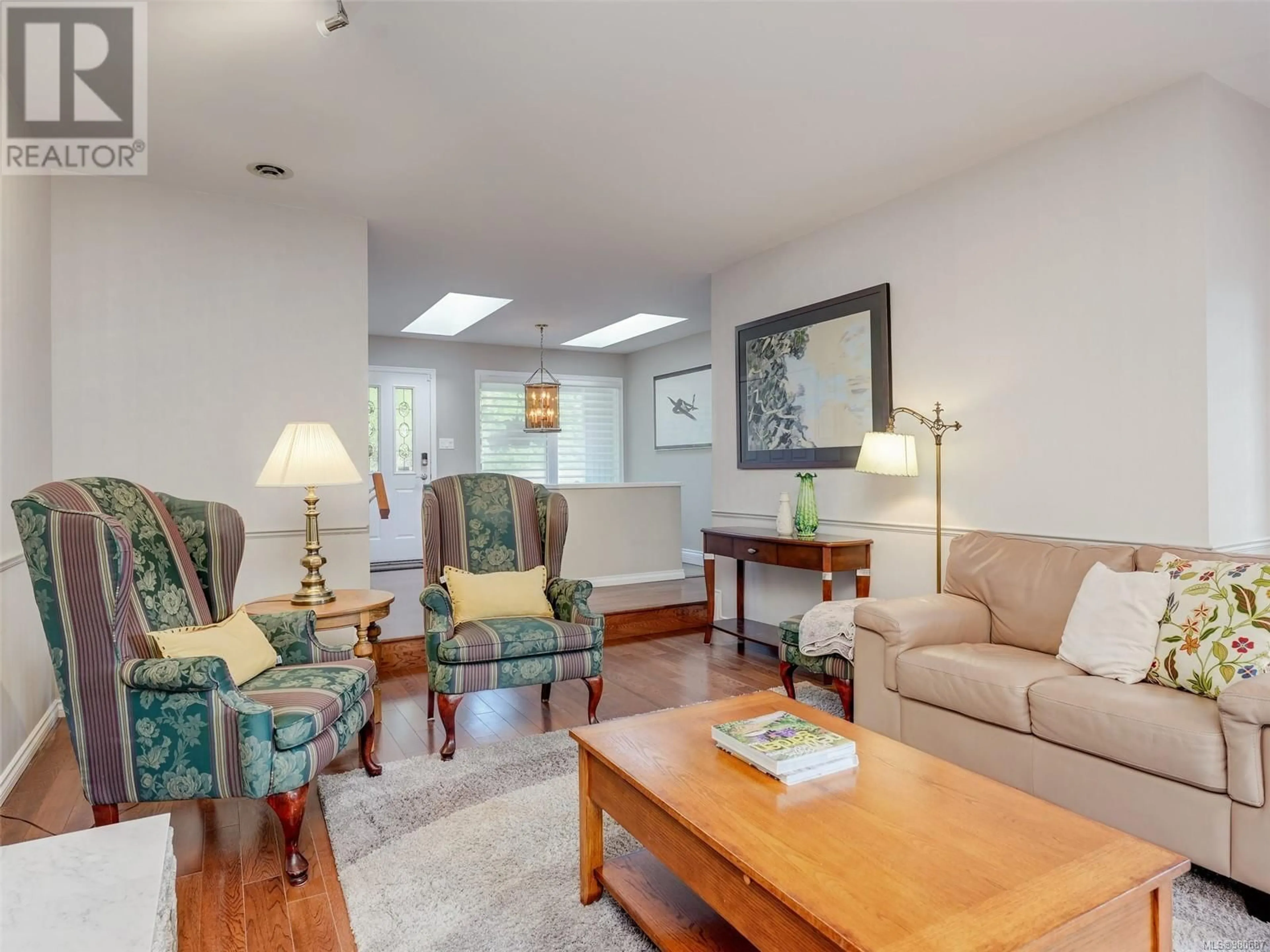 Living room, wood floors for 8607 Sansum Park Dr, North Saanich British Columbia V8L4W8