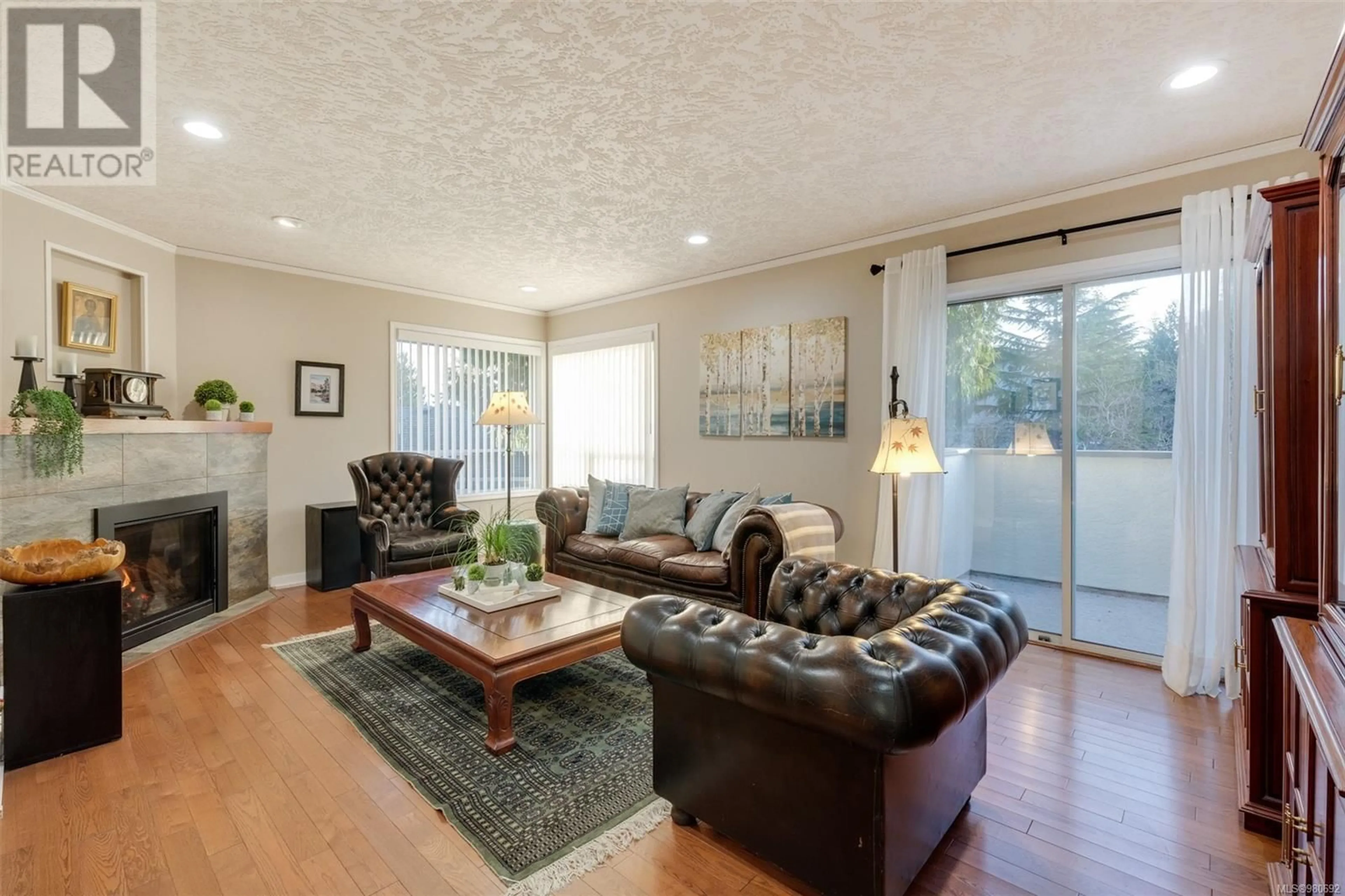 Living room, wood floors for 8535 Tribune Terr, North Saanich British Columbia V8L5B6