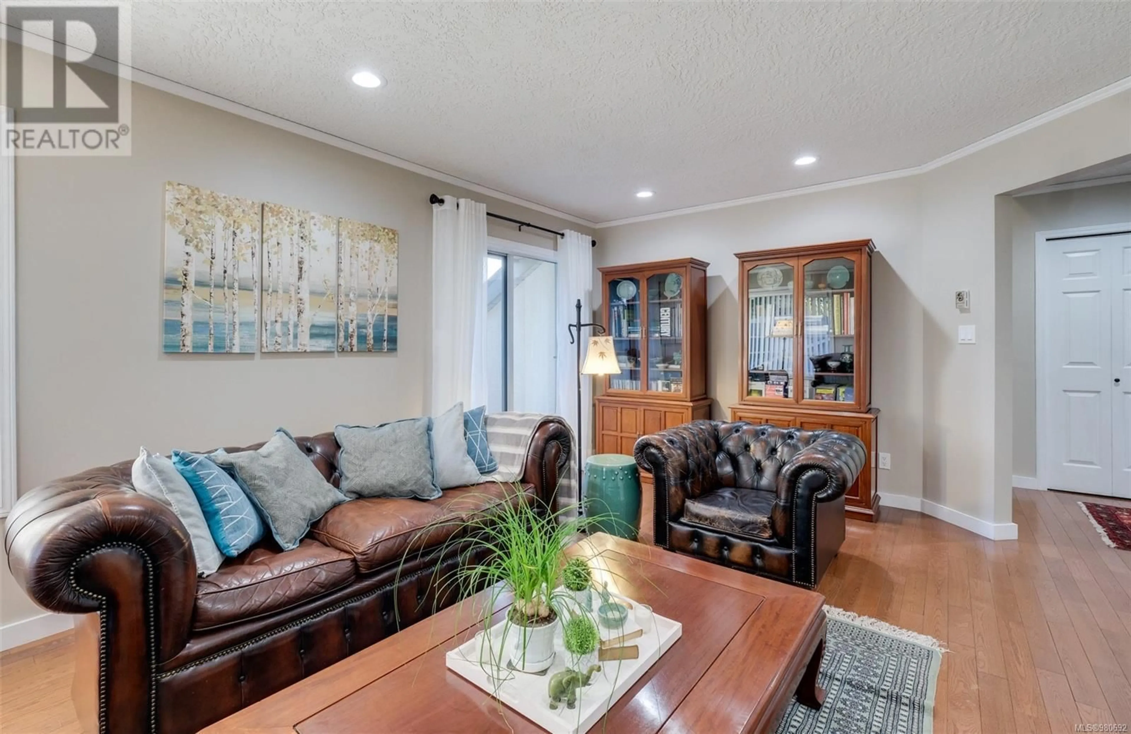 Living room, wood floors for 8535 Tribune Terr, North Saanich British Columbia V8L5B6