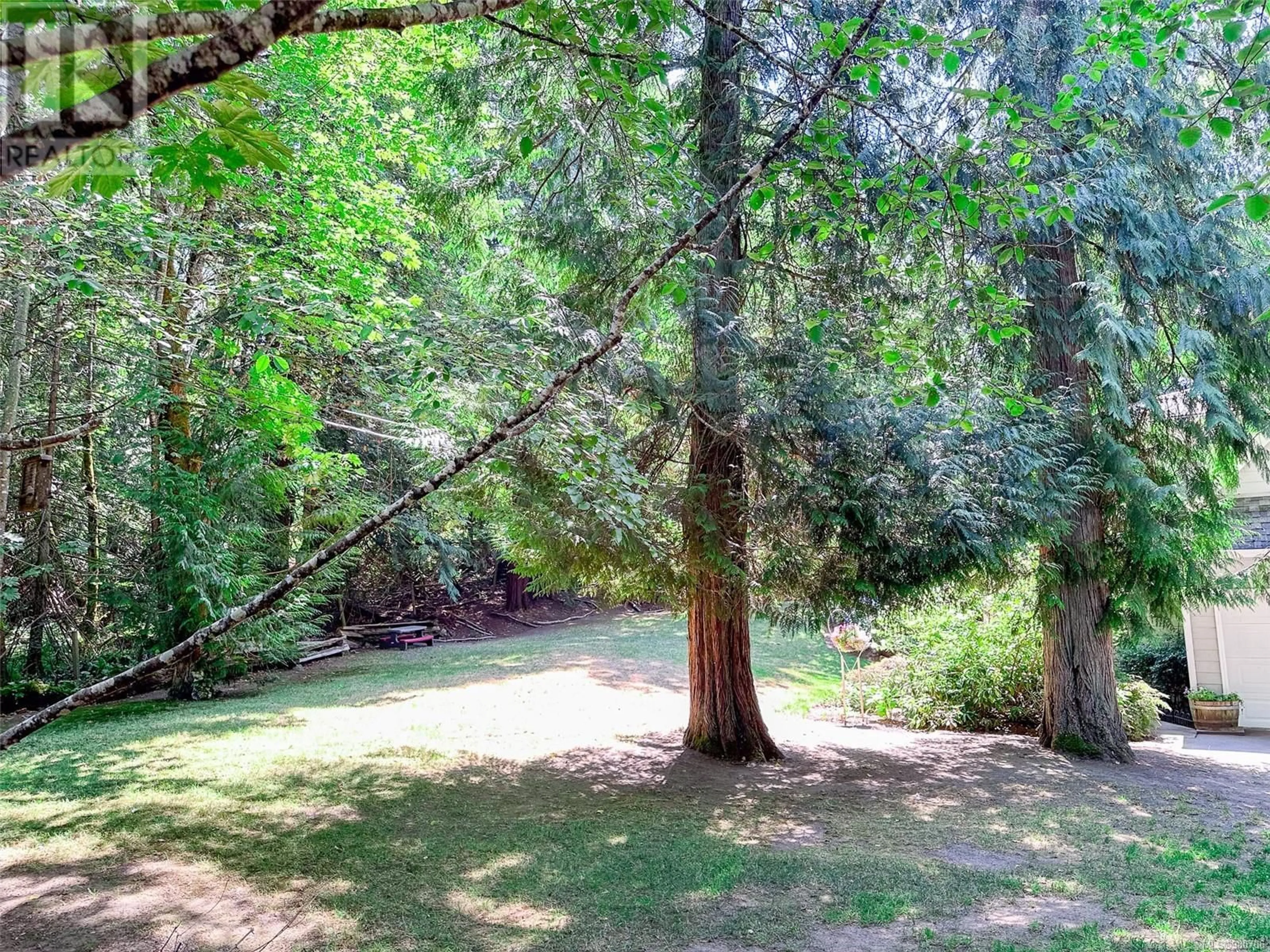 Patio, the fenced backyard for 2423 Galland Rd, Shawnigan Lake British Columbia V0R2W2