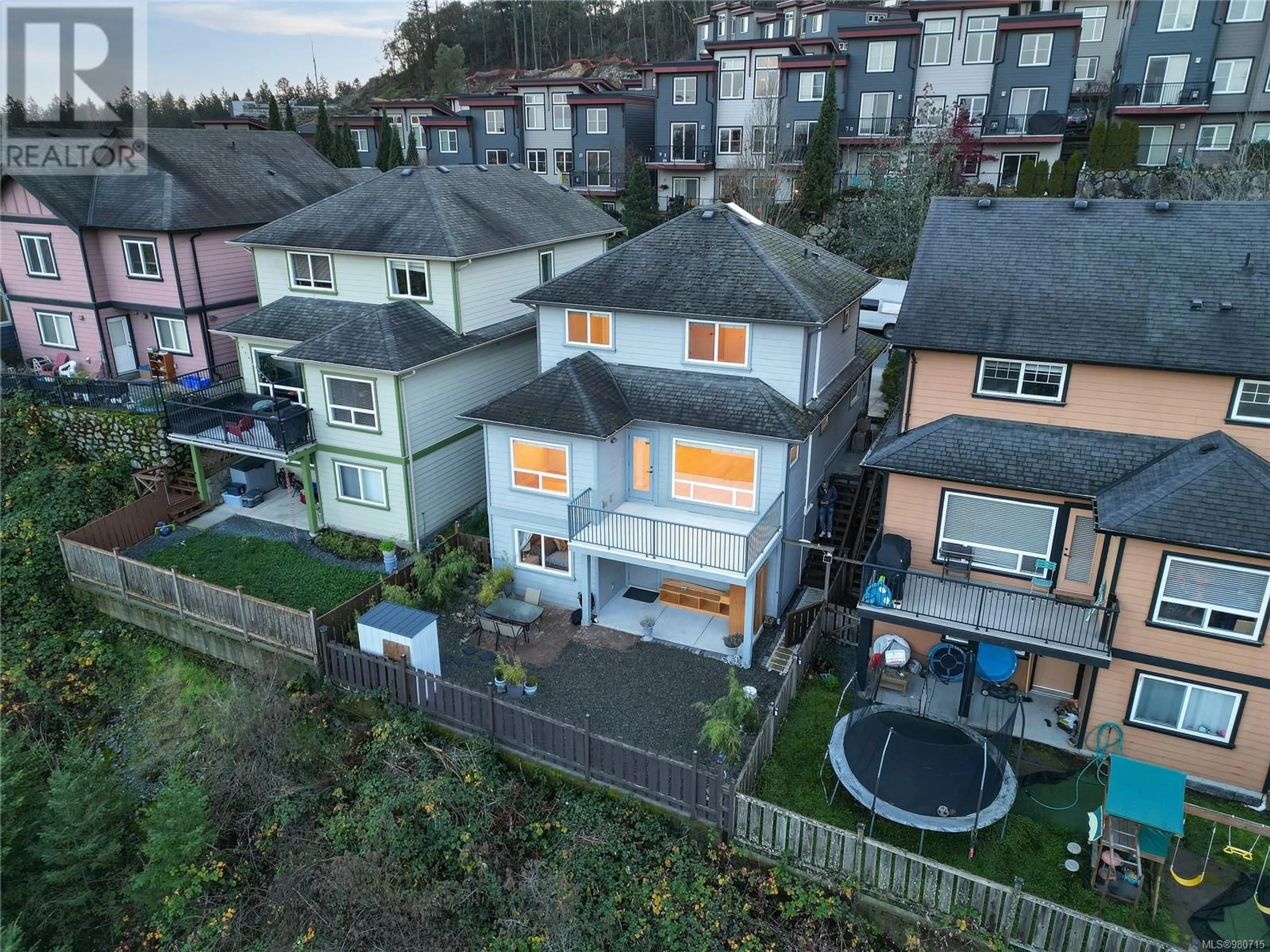 Frontside or backside of a home, the fenced backyard for 2105 LONGSPUR Dr, Langford British Columbia V9B0E7