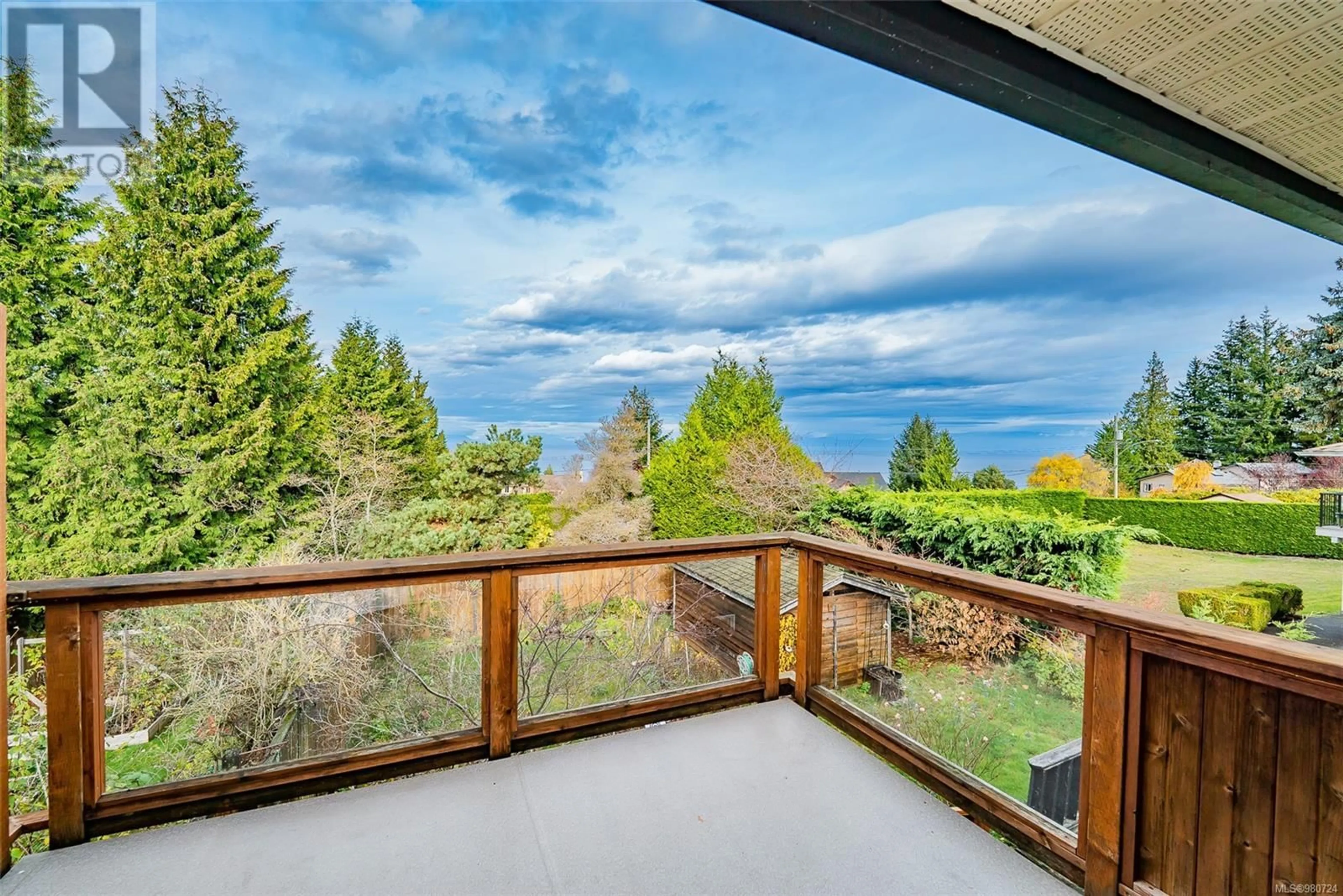 Patio, the fenced backyard for 5524-5526 Lost Lake Rd, Nanaimo British Columbia V9T5G4