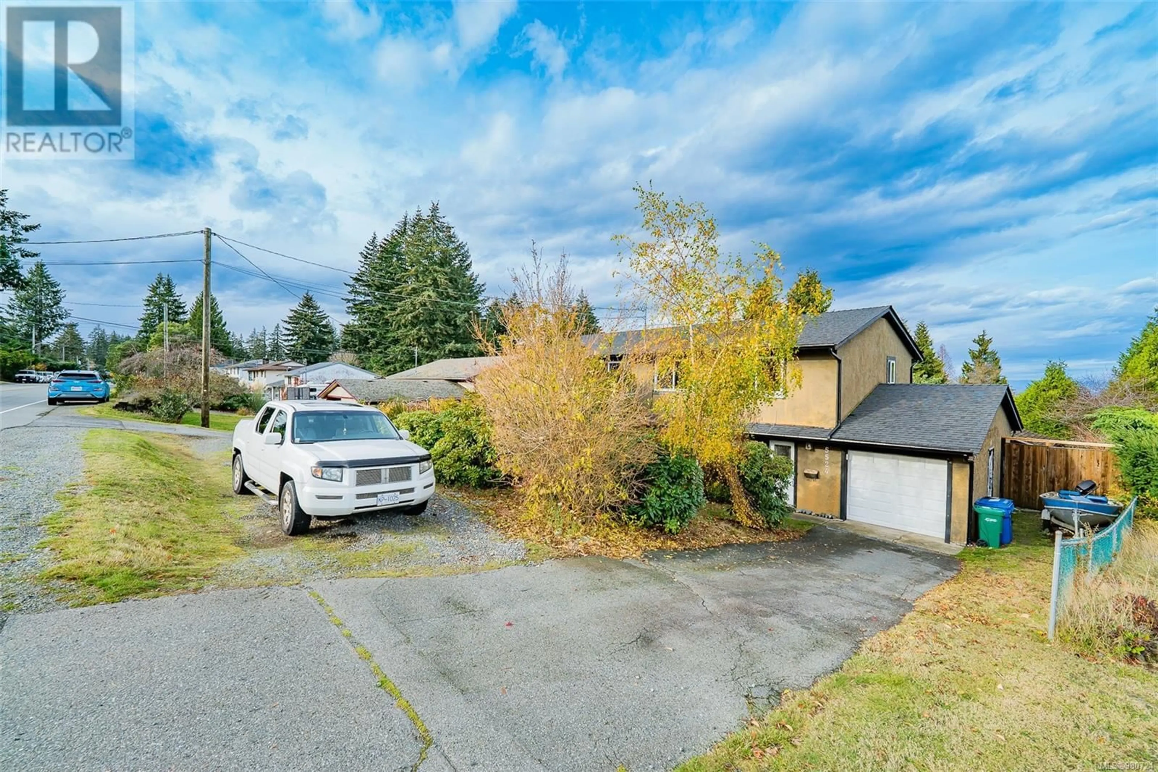 Frontside or backside of a home, the street view for 5524-5526 Lost Lake Rd, Nanaimo British Columbia V9T5G4