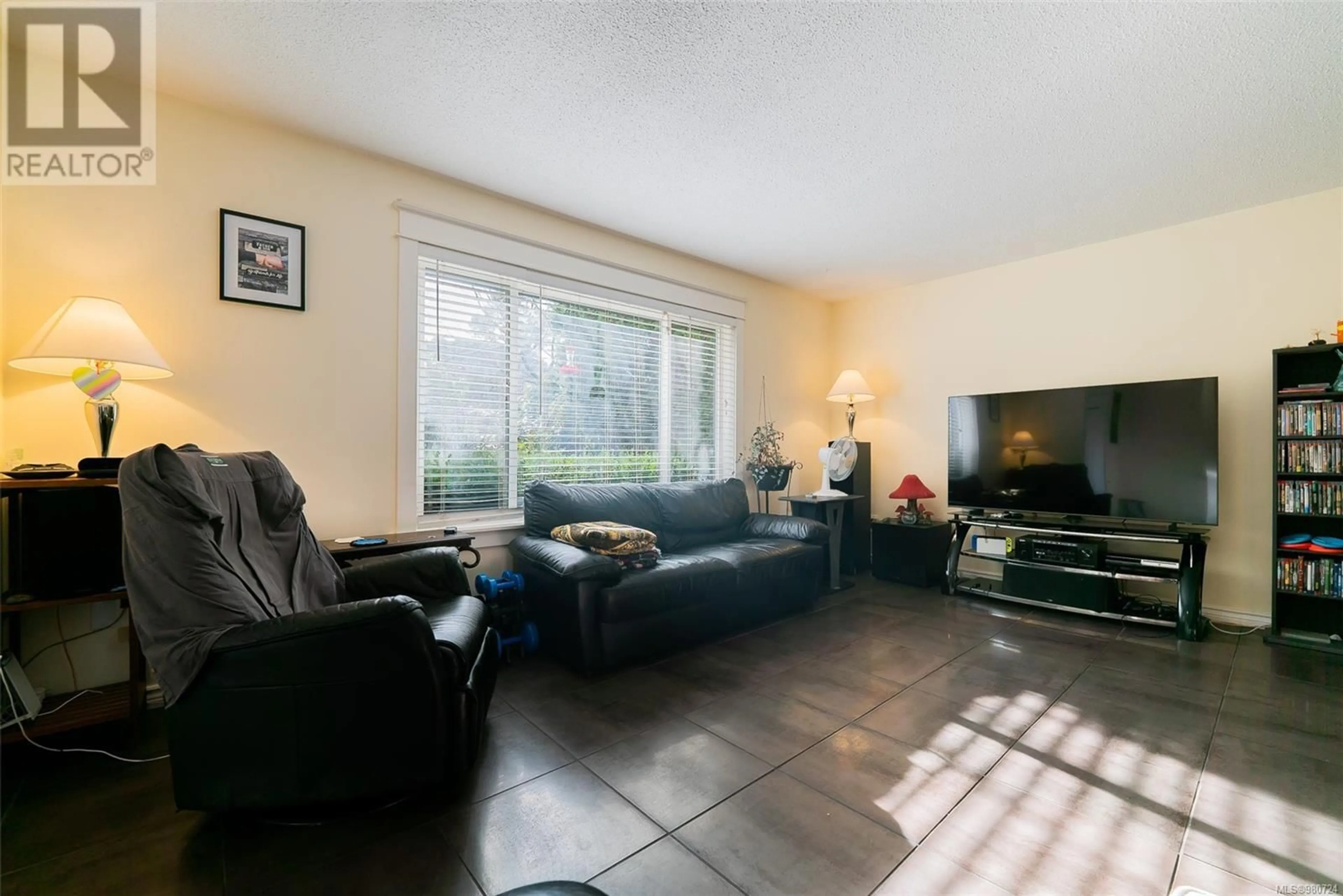 Living room, wood floors for 5524-5526 Lost Lake Rd, Nanaimo British Columbia V9T5G4