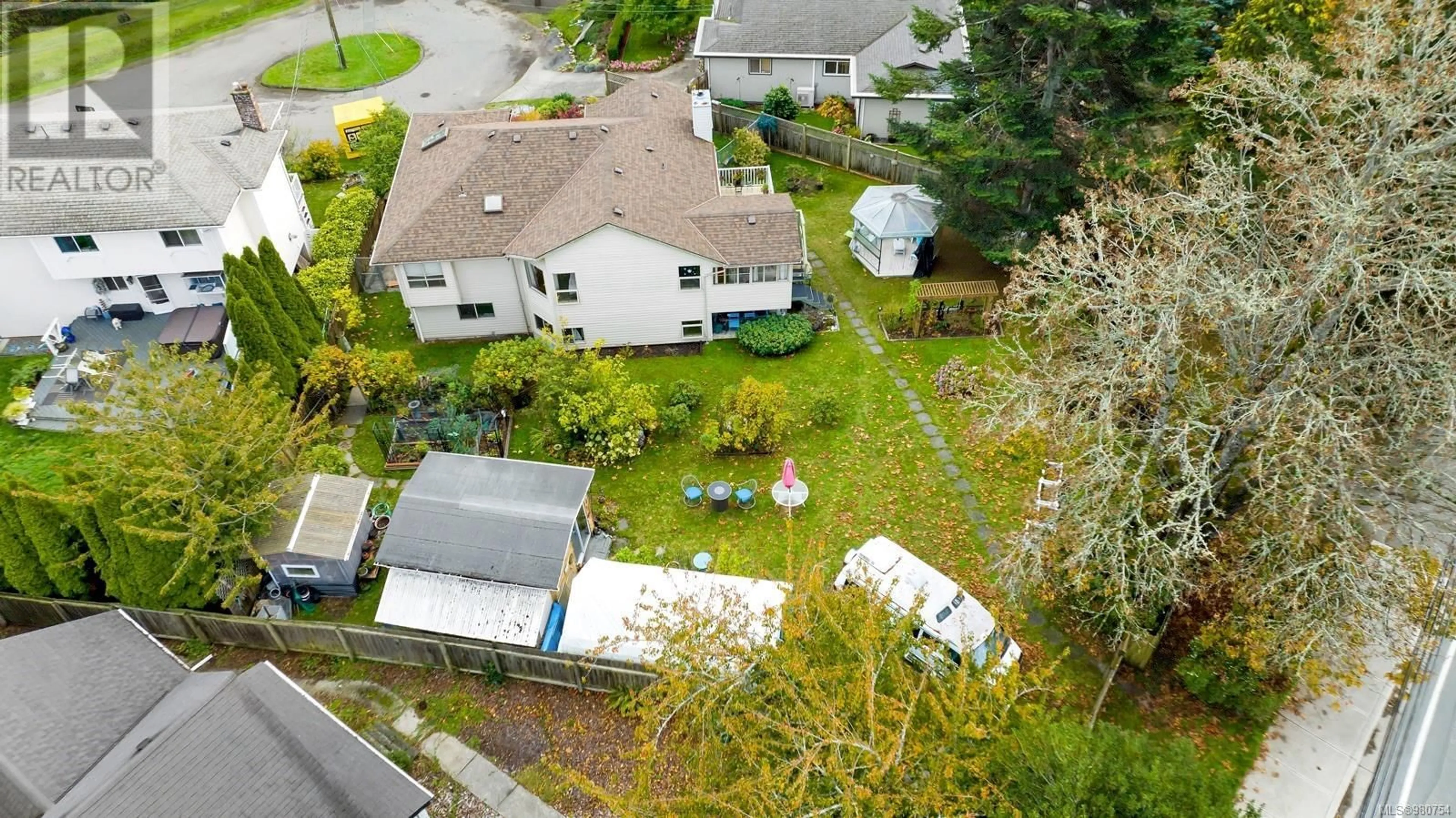 Frontside or backside of a home, the fenced backyard for 6756 Horne Rd, Sooke British Columbia V0S1N0