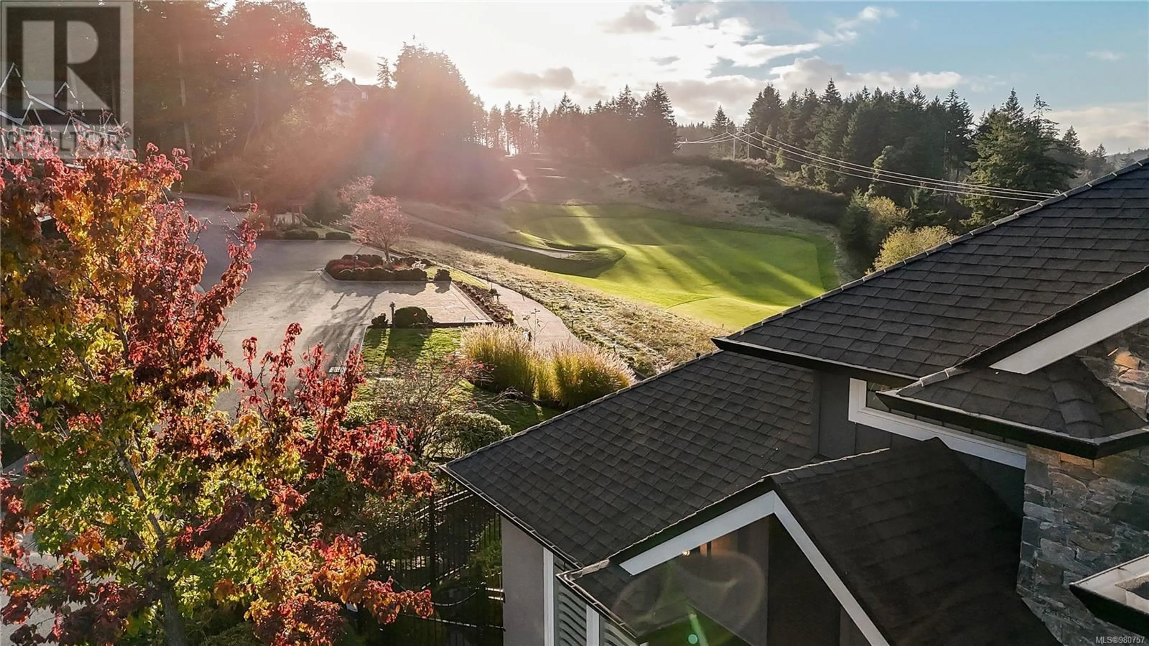 Frontside or backside of a home, the fenced backyard for 1240 Muirfield Pl, Langford British Columbia V9B6T2