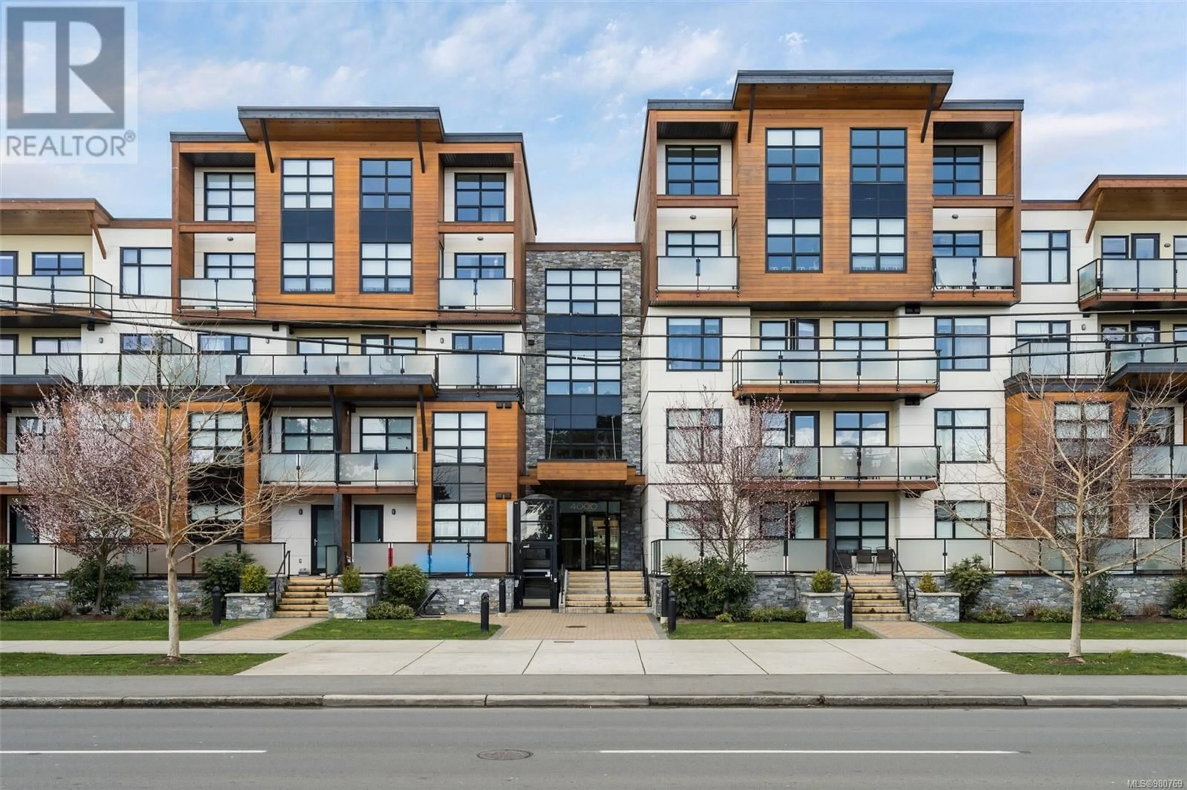 A pic from exterior of the house or condo, the front or back of building for 203 4000 Shelbourne St, Saanich British Columbia V8N0B6