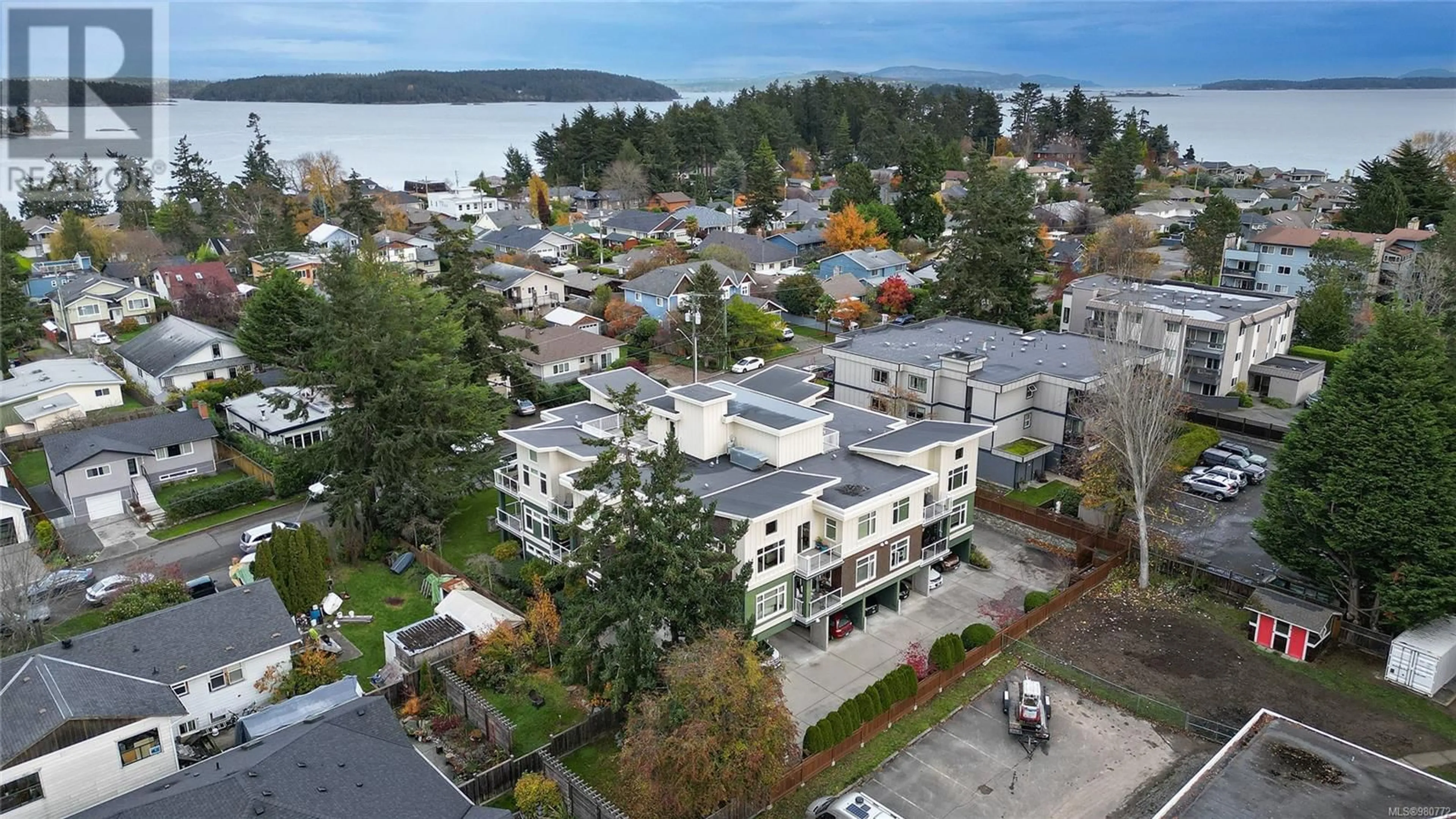 A pic from exterior of the house or condo, the street view for 201 2415 Amherst Ave, Sidney British Columbia V8L2H1