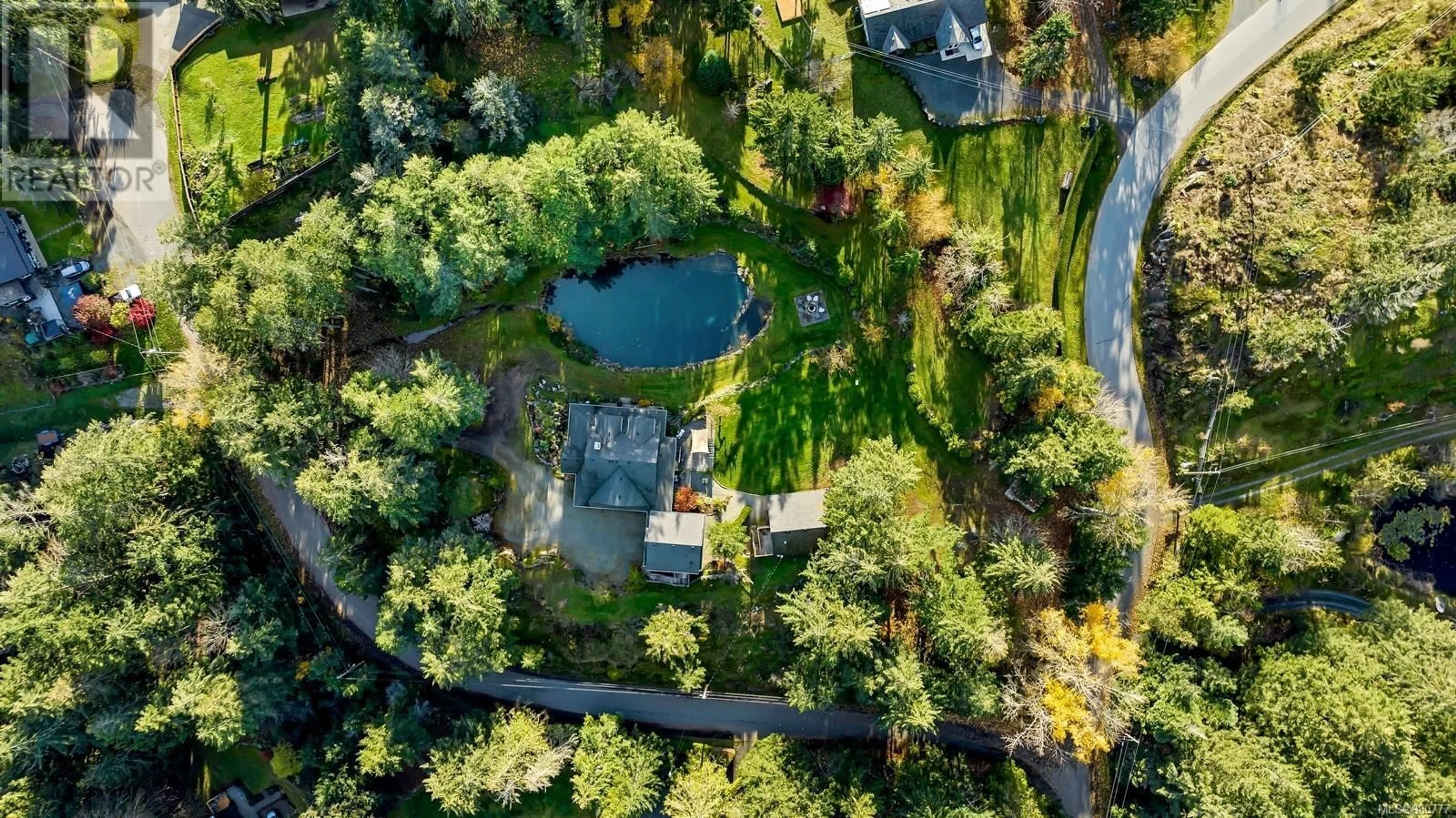 A pic from exterior of the house or condo, the fenced backyard for 7338 Walton Mountain Rd, Duncan British Columbia V9L5W8