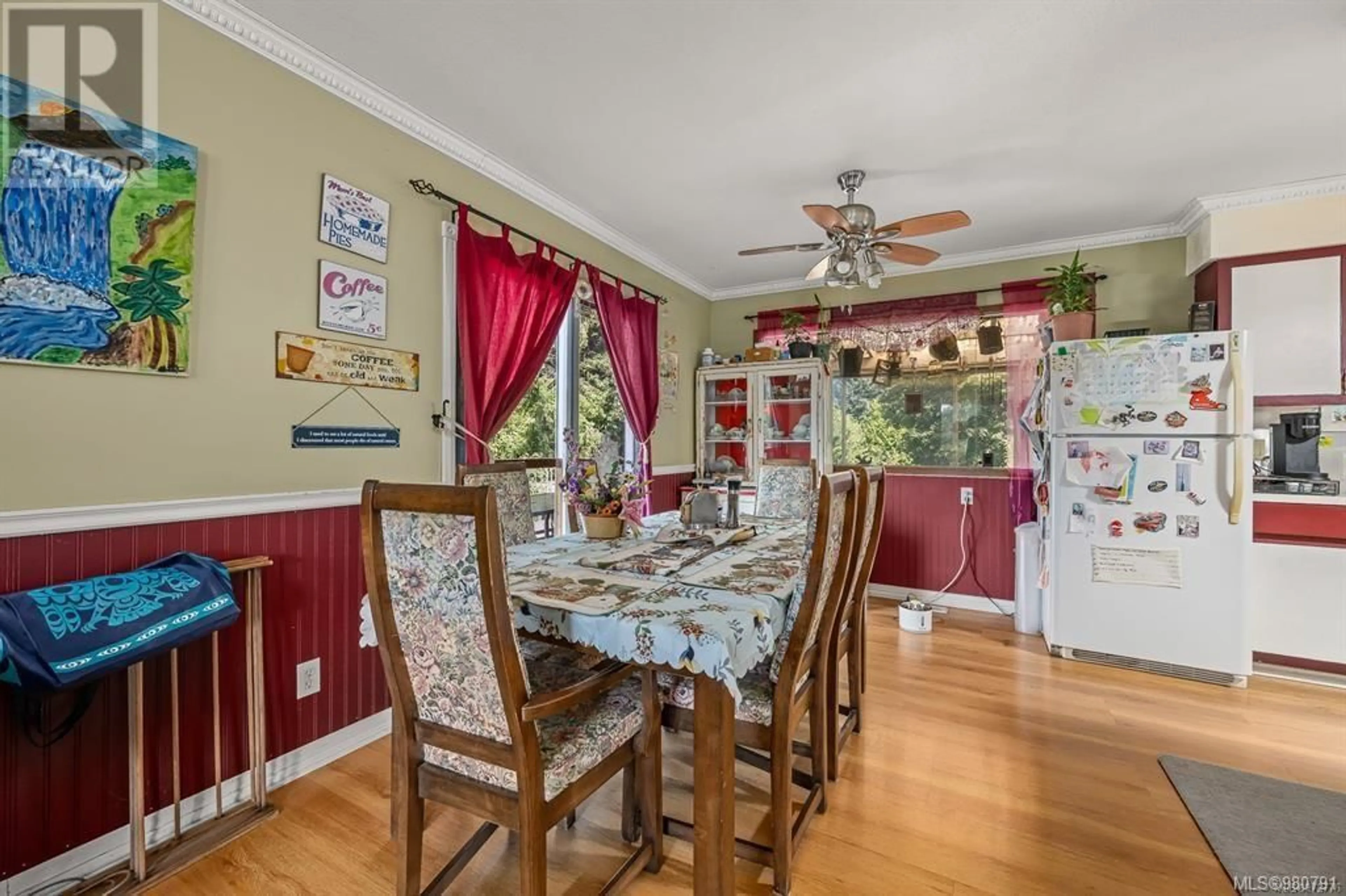 Dining room, wood floors, cottage for 4732 Oakridge Dr, Courtenay British Columbia V9N6A8