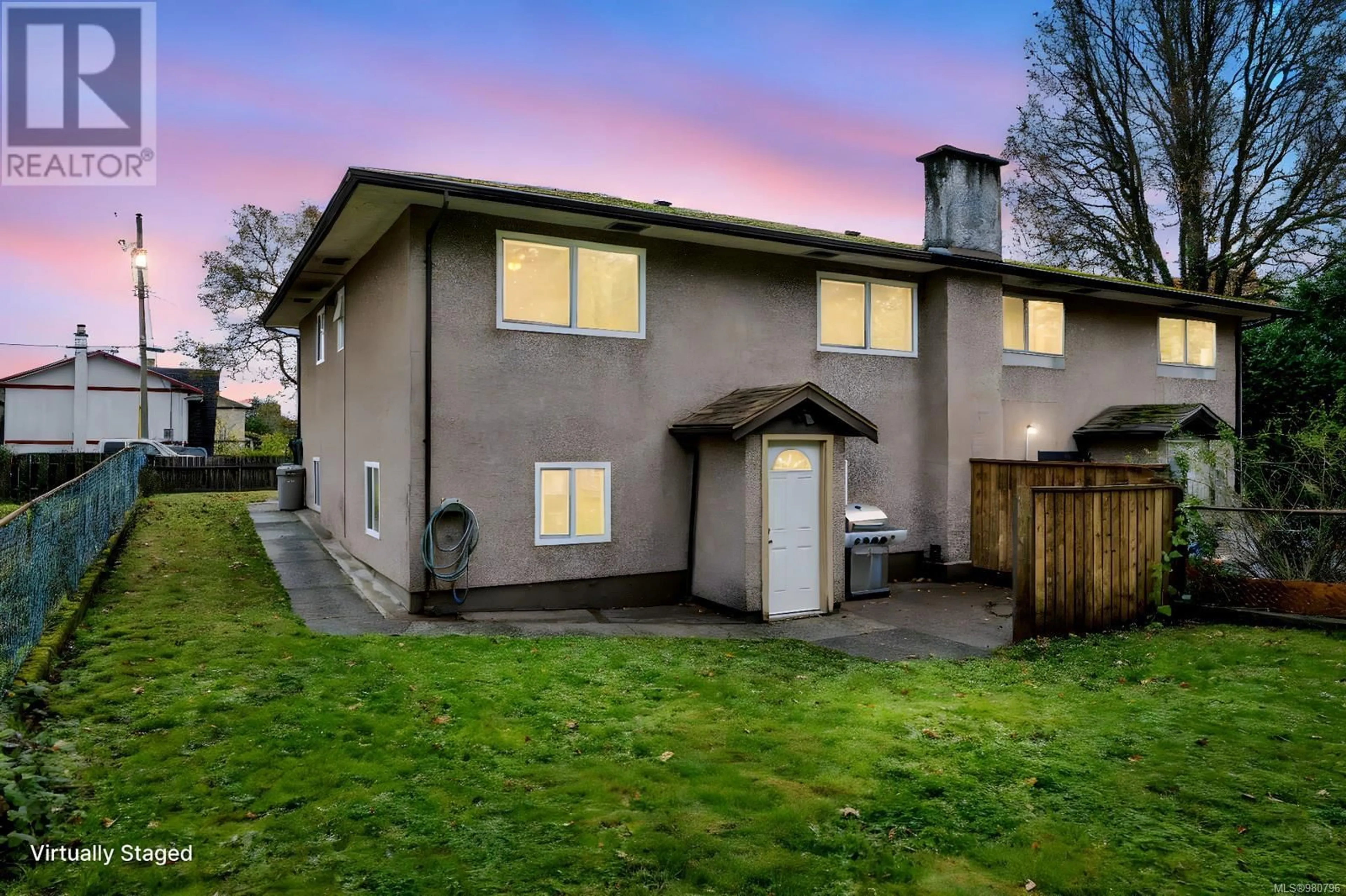 Frontside or backside of a home, the fenced backyard for 2840 Sybronden Rd, Langford British Columbia V9B4A6