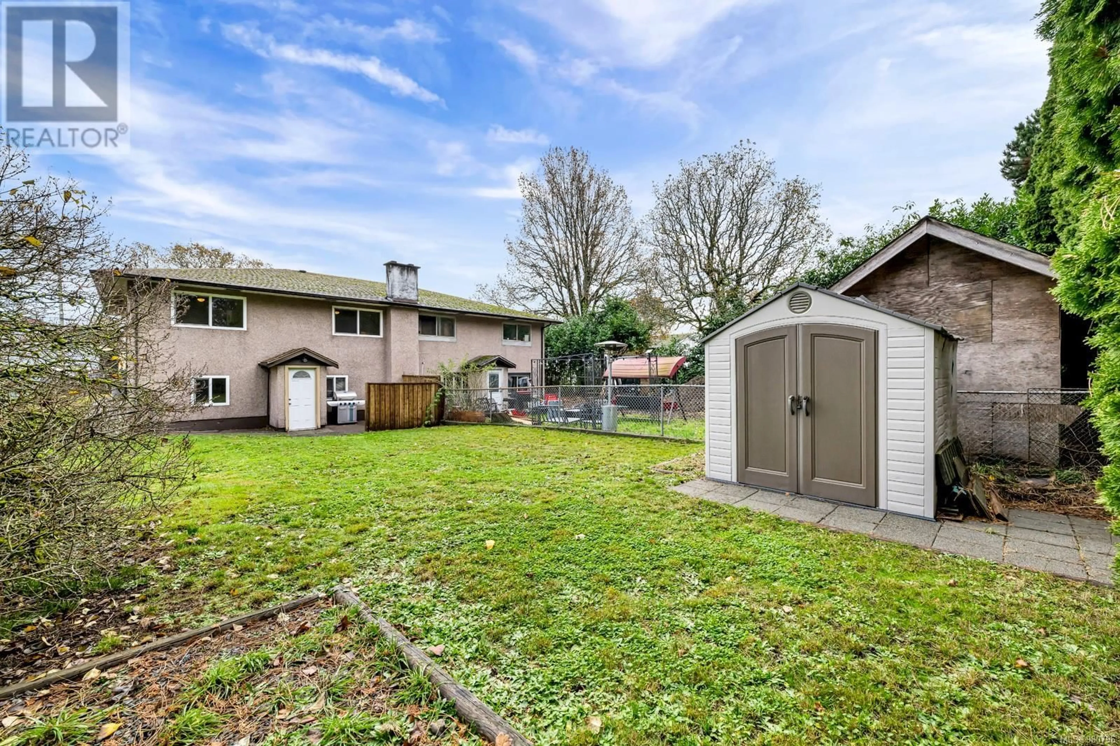 A pic from exterior of the house or condo, the fenced backyard for 2840 Sybronden Rd, Langford British Columbia V9B4A6