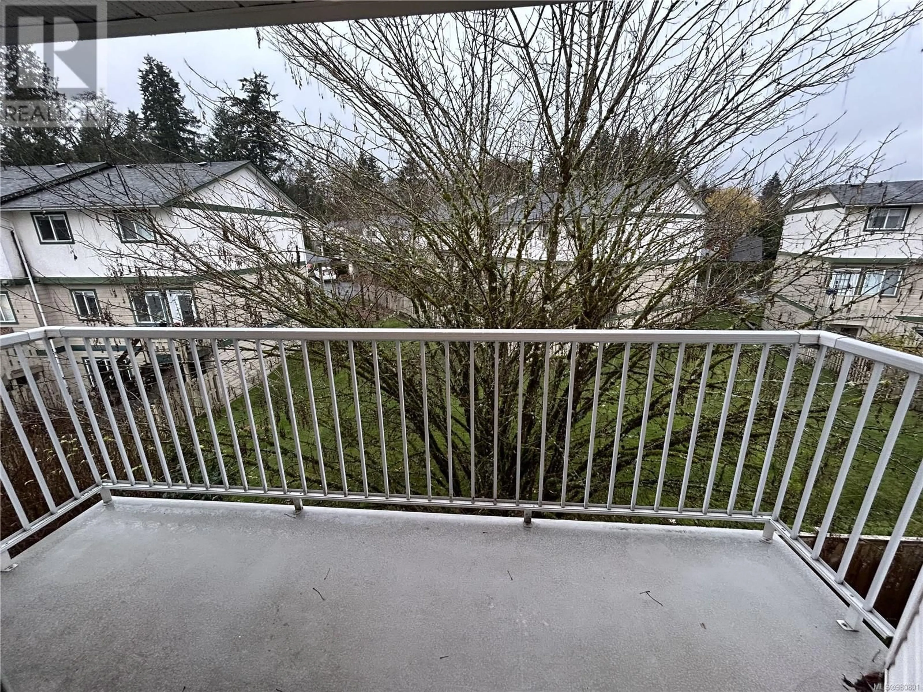 Balcony in the apartment, the fenced backyard for 306 3226 Cowichan Lake Rd, Duncan British Columbia V9L4B9