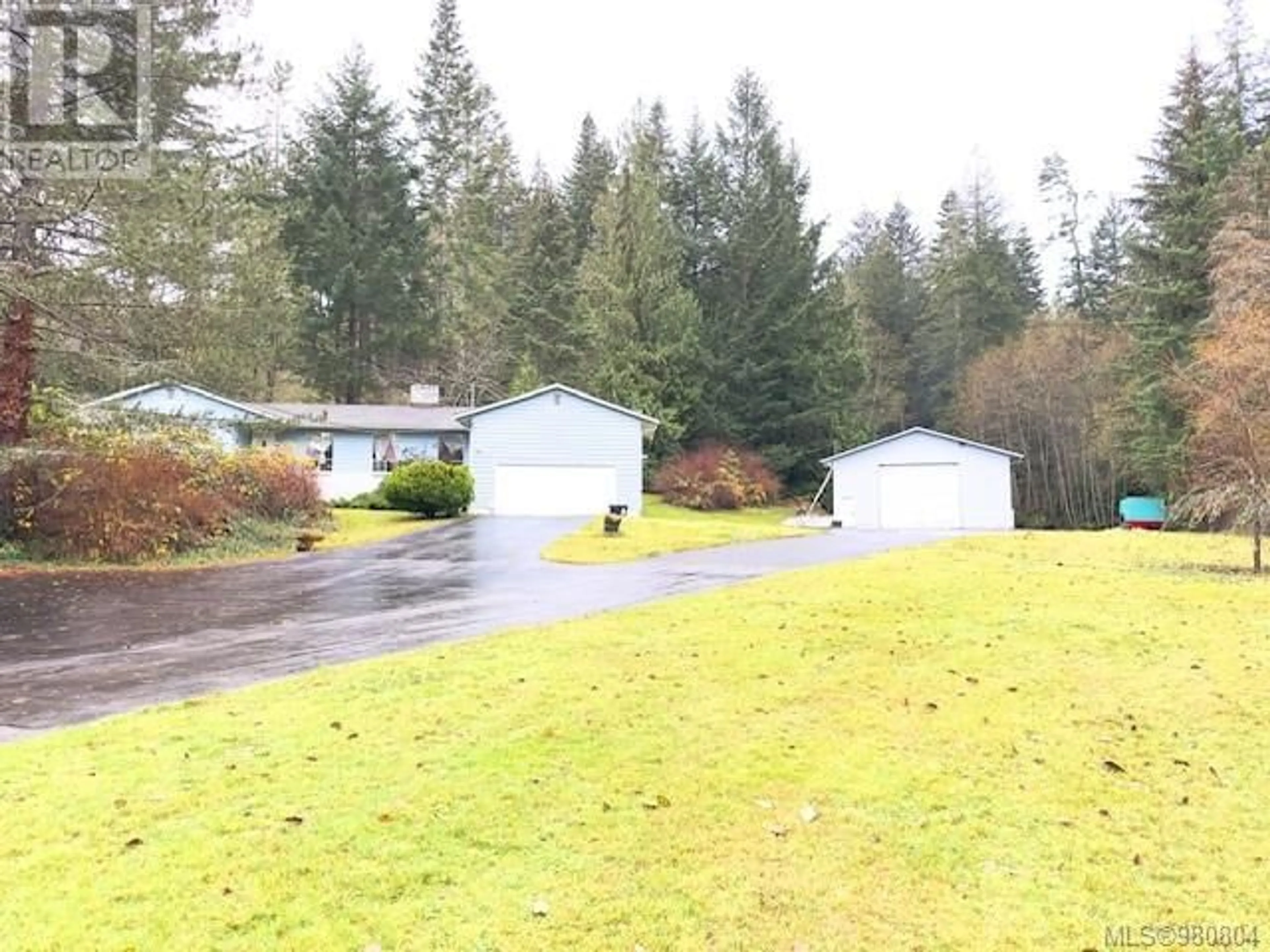 Frontside or backside of a home, the street view for 6513 Phantom Rd, Lantzville British Columbia V0R2H0