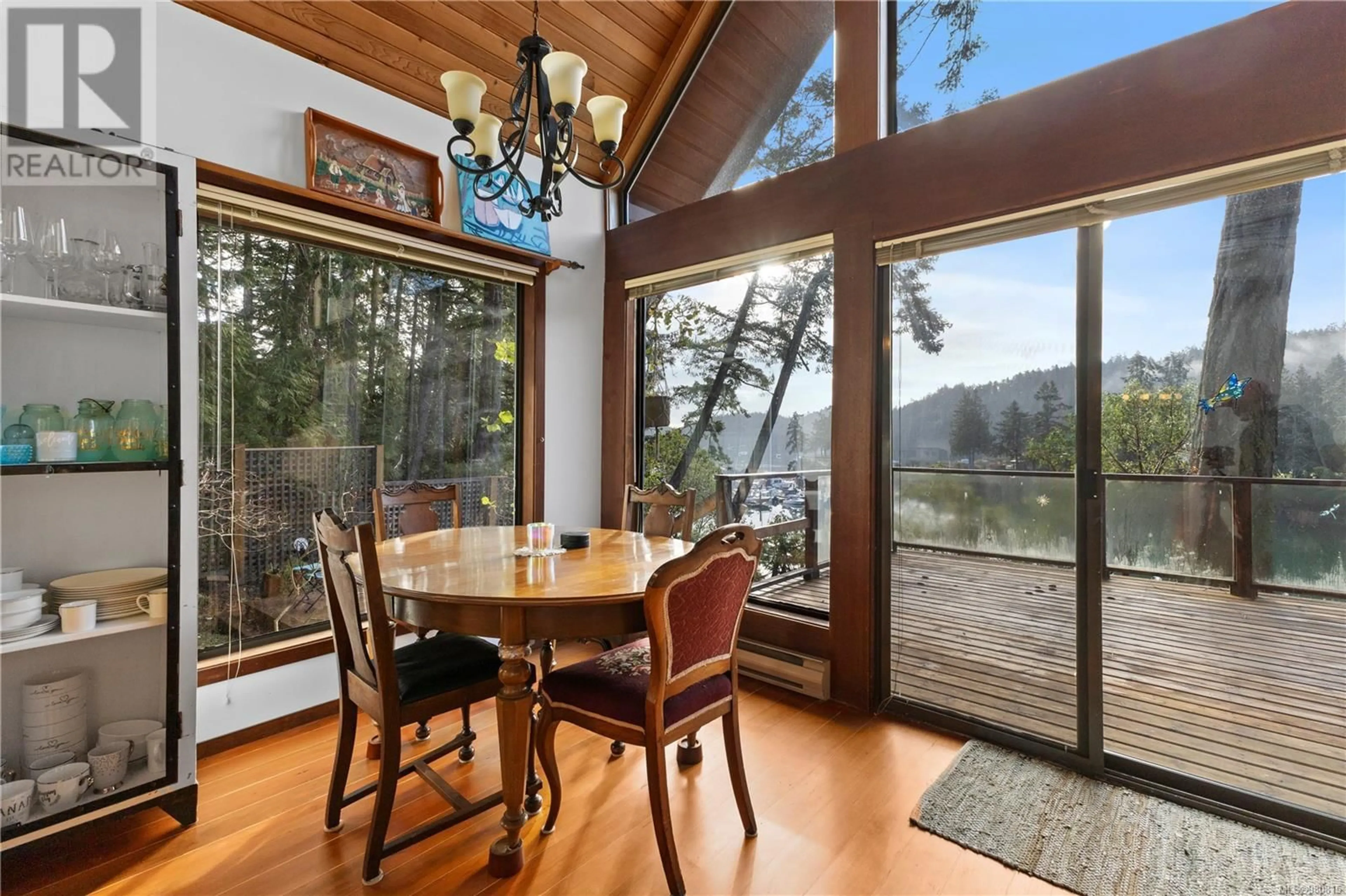 Dining room, wood floors, cottage for 4602 Pecos Rd, Pender Island British Columbia V0N2M1