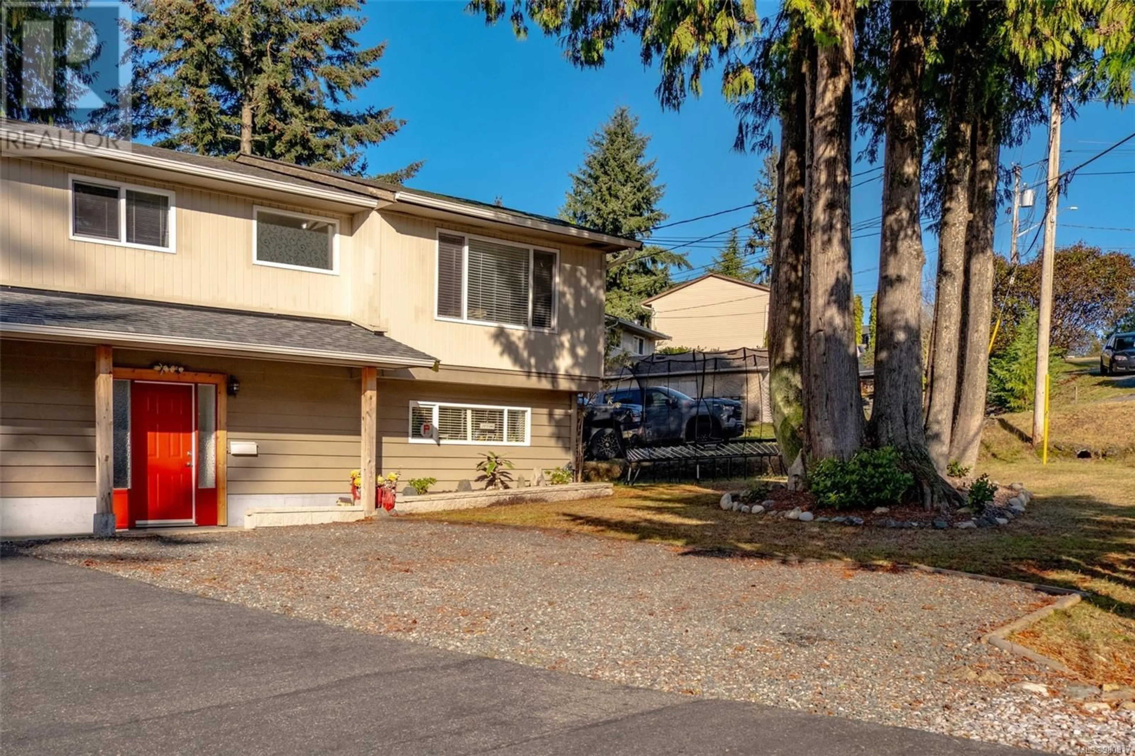 A pic from exterior of the house or condo, the fenced backyard for 3301 Dingle Bingle Hill Rd, Nanaimo British Columbia V9T3V6