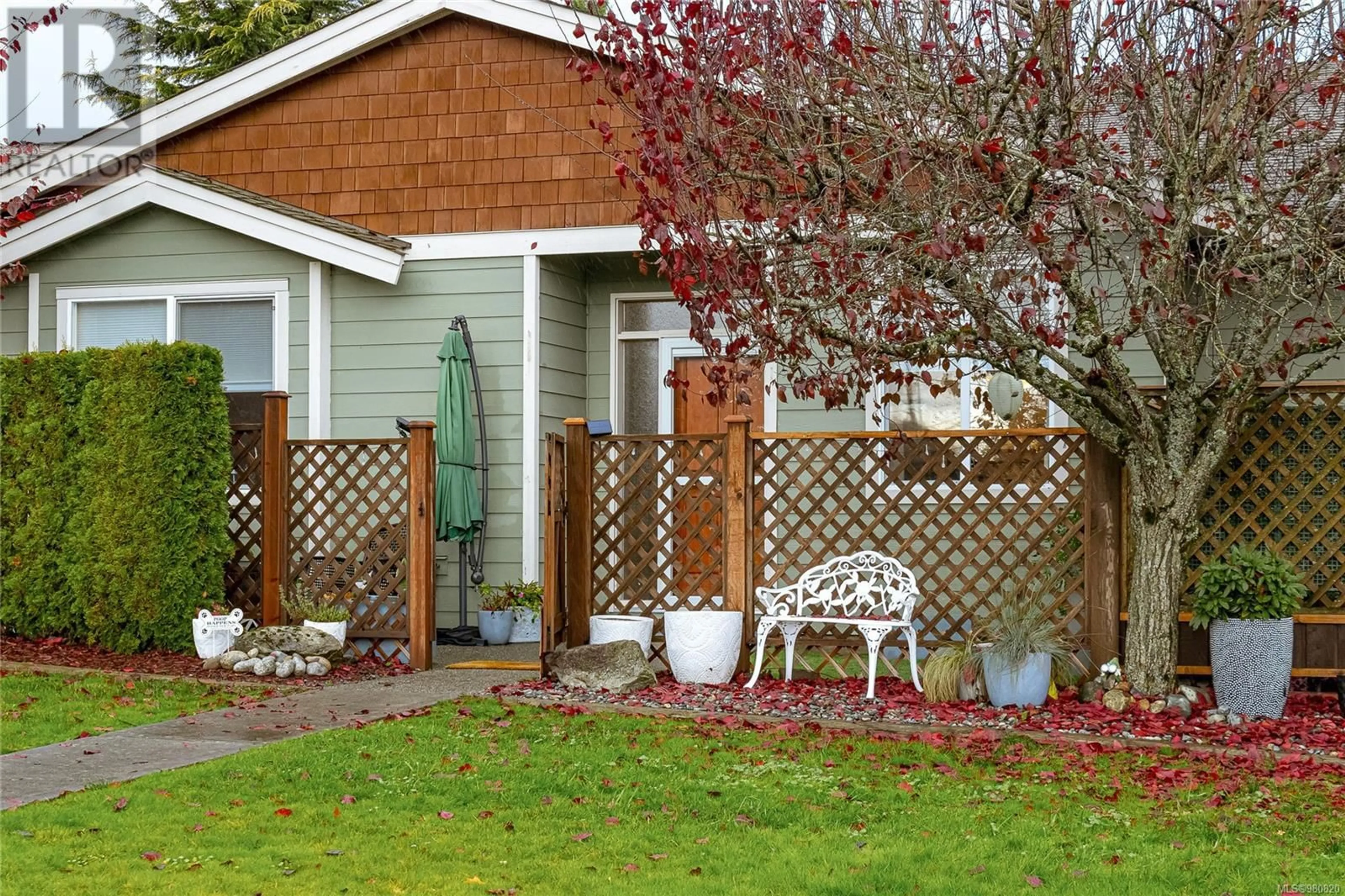 Patio, the fenced backyard for 2 332 Belaire St, Ladysmith British Columbia V9G1B1