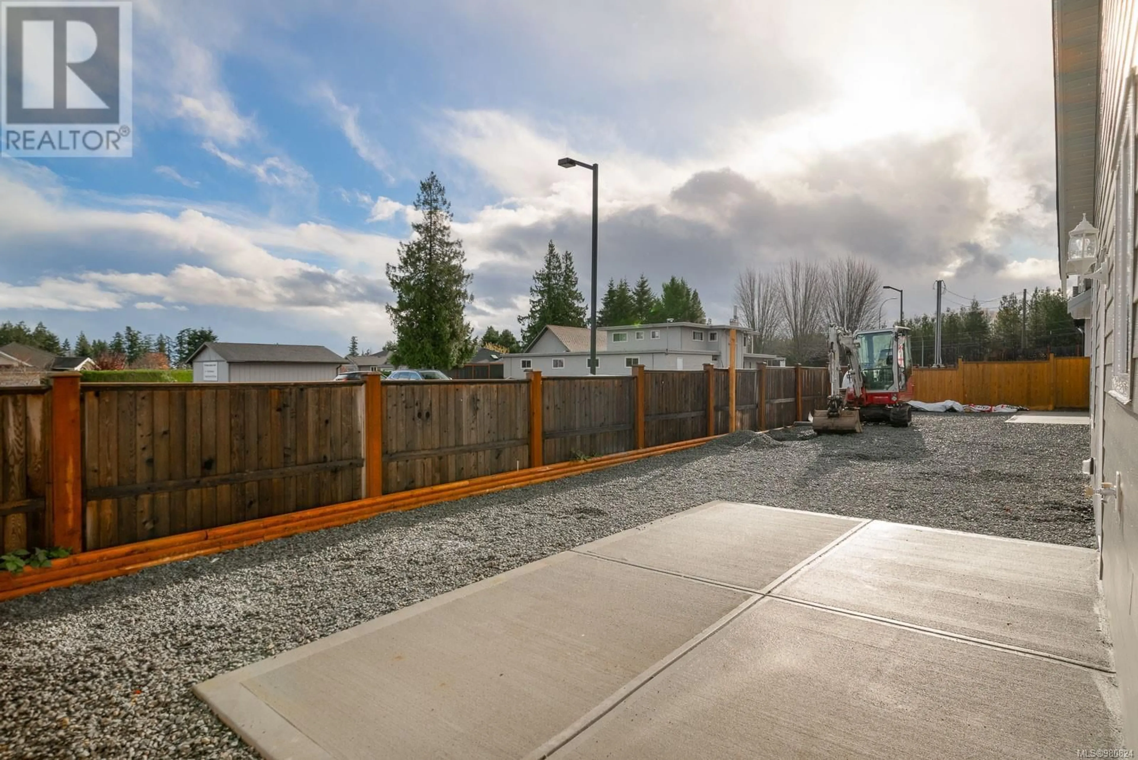 Patio, the fenced backyard for 472 Hampstead St, Parksville British Columbia V9P0G5