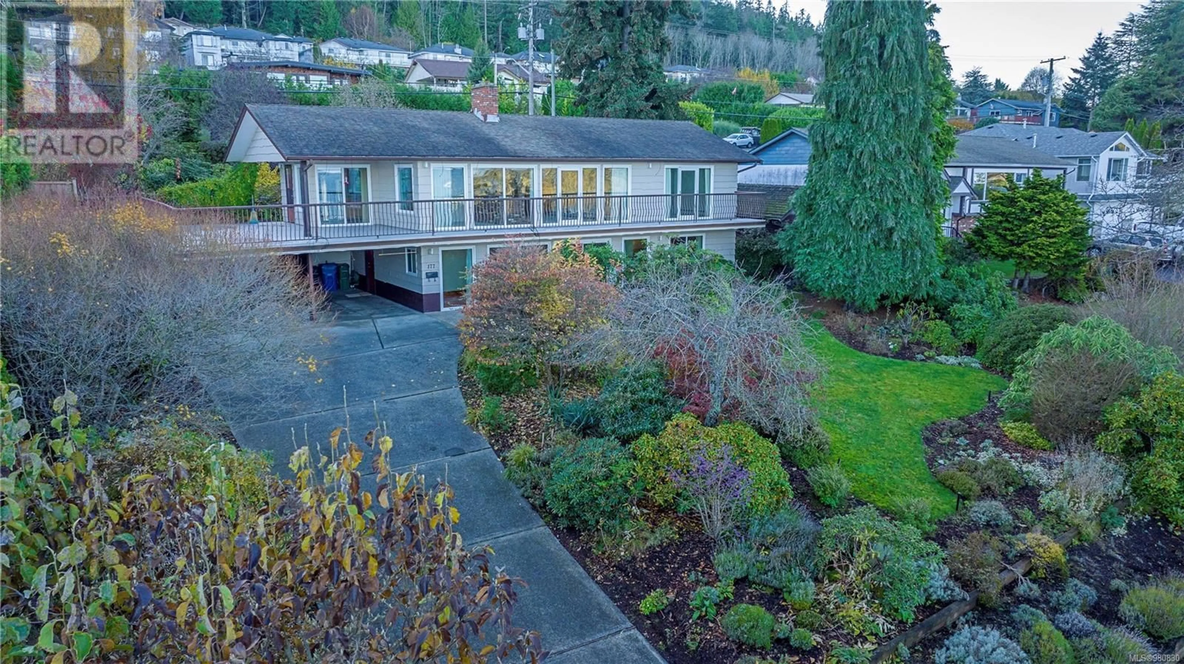 A pic from exterior of the house or condo, the fenced backyard for 177 Piper Cres, Nanaimo British Columbia V9T3B9