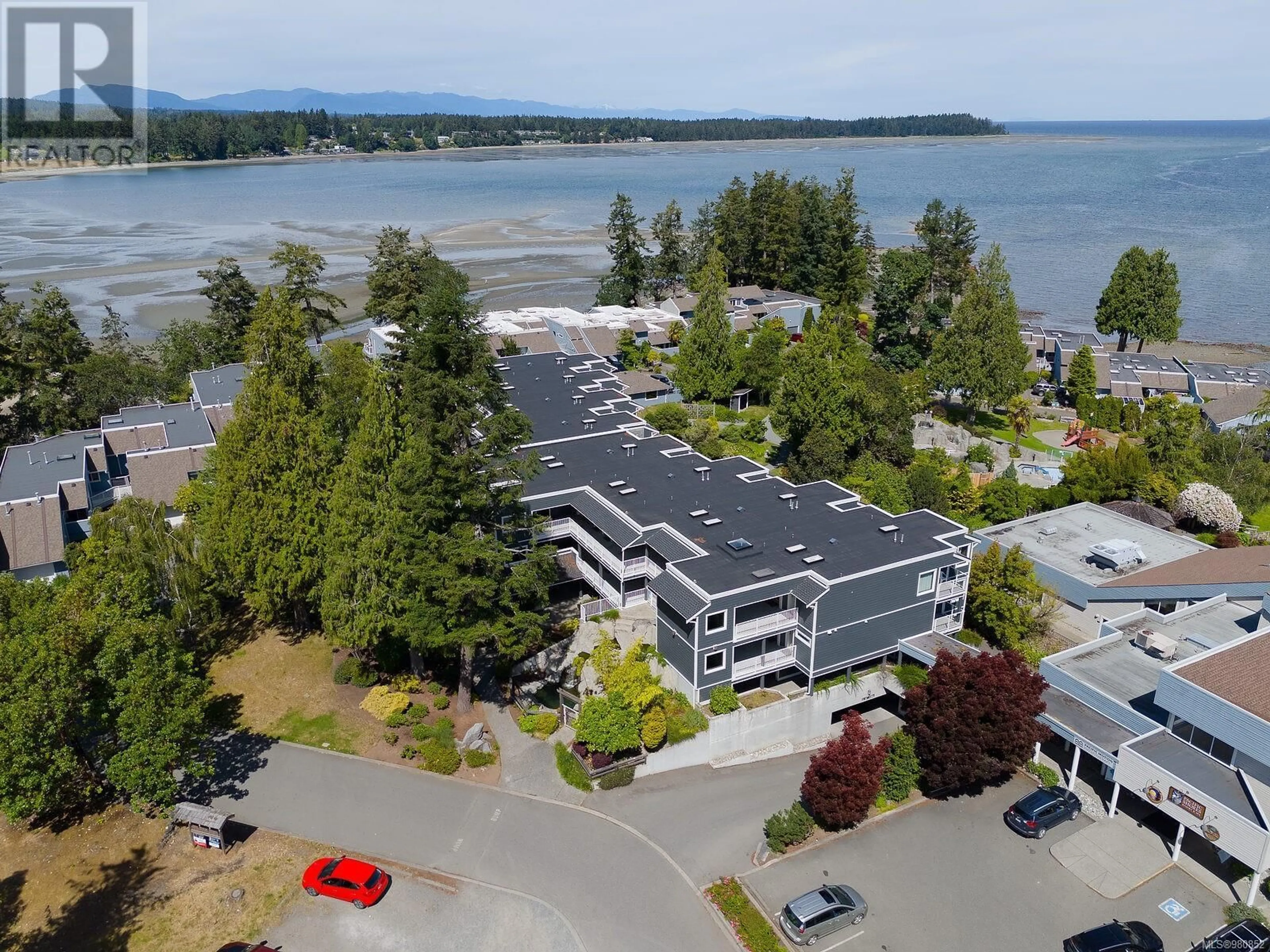 A pic from outside/outdoor area/front of a property/back of a property/a pic from drone, water/lake/river/ocean view for 714 - 1600 STROULGER ROAD, Nanoose Bay British Columbia V9P9B7