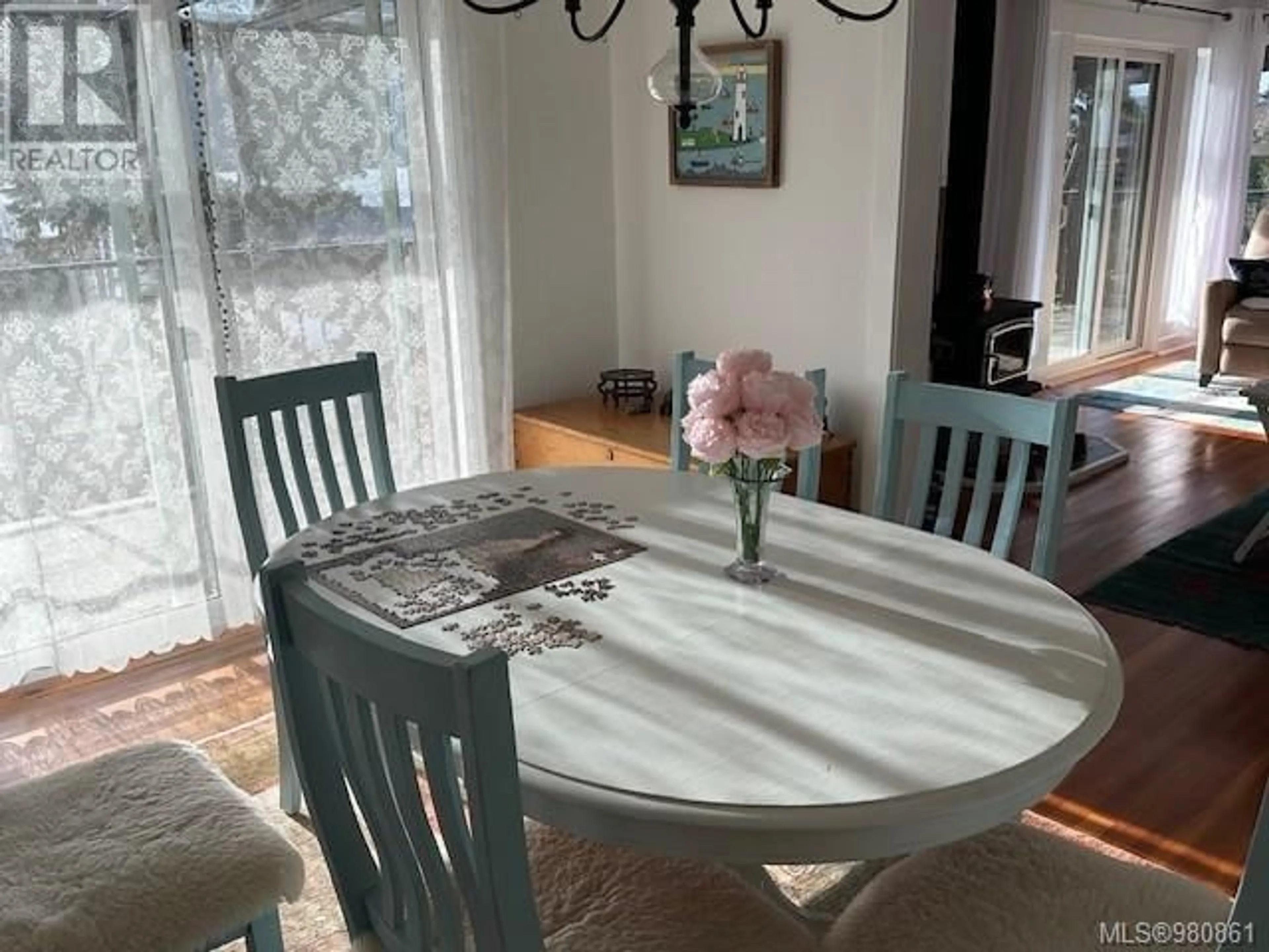 Dining room, wood floors, cottage for 10668 Cedar Dr, Youbou British Columbia V0R3E0