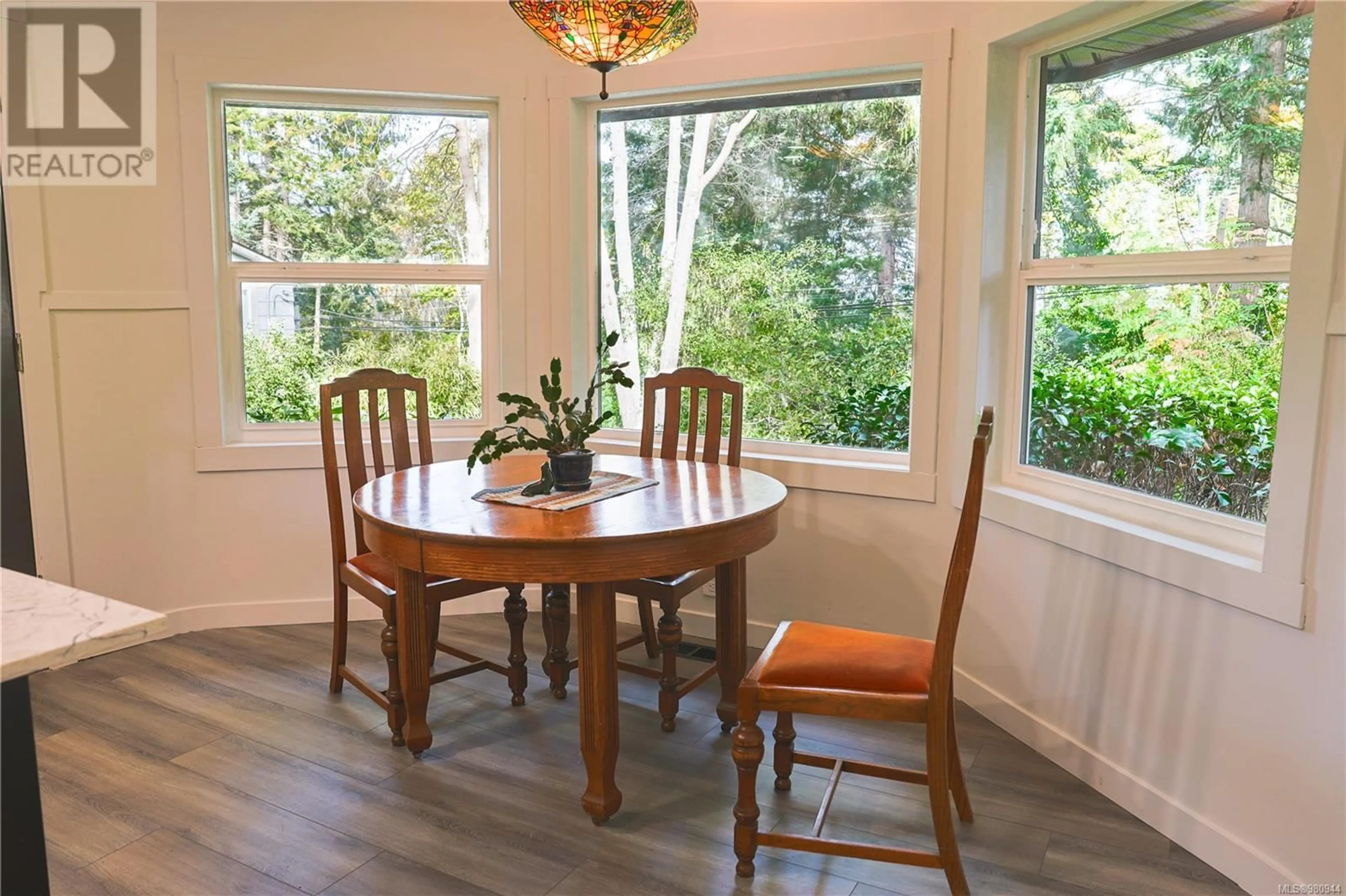 Dining room, wood floors, cottage for 7773 Lantzville Rd, Lantzville British Columbia V0R2H0