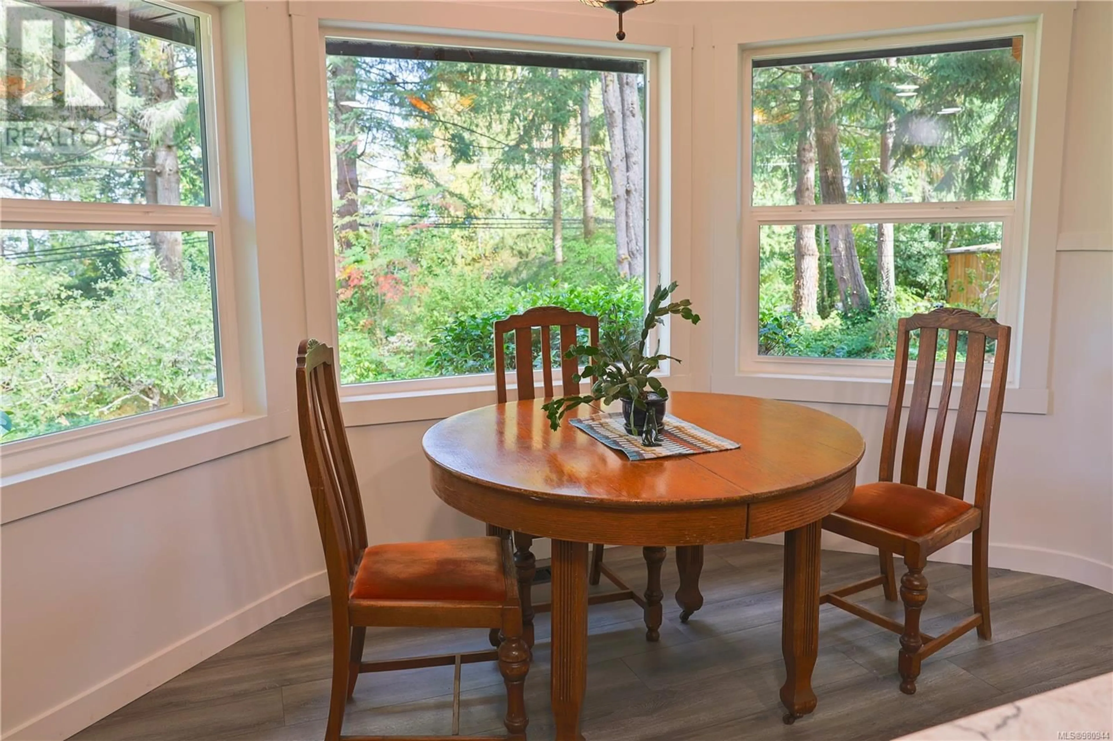 Dining room, wood floors, cottage for 7773 Lantzville Rd, Lantzville British Columbia V0R2H0