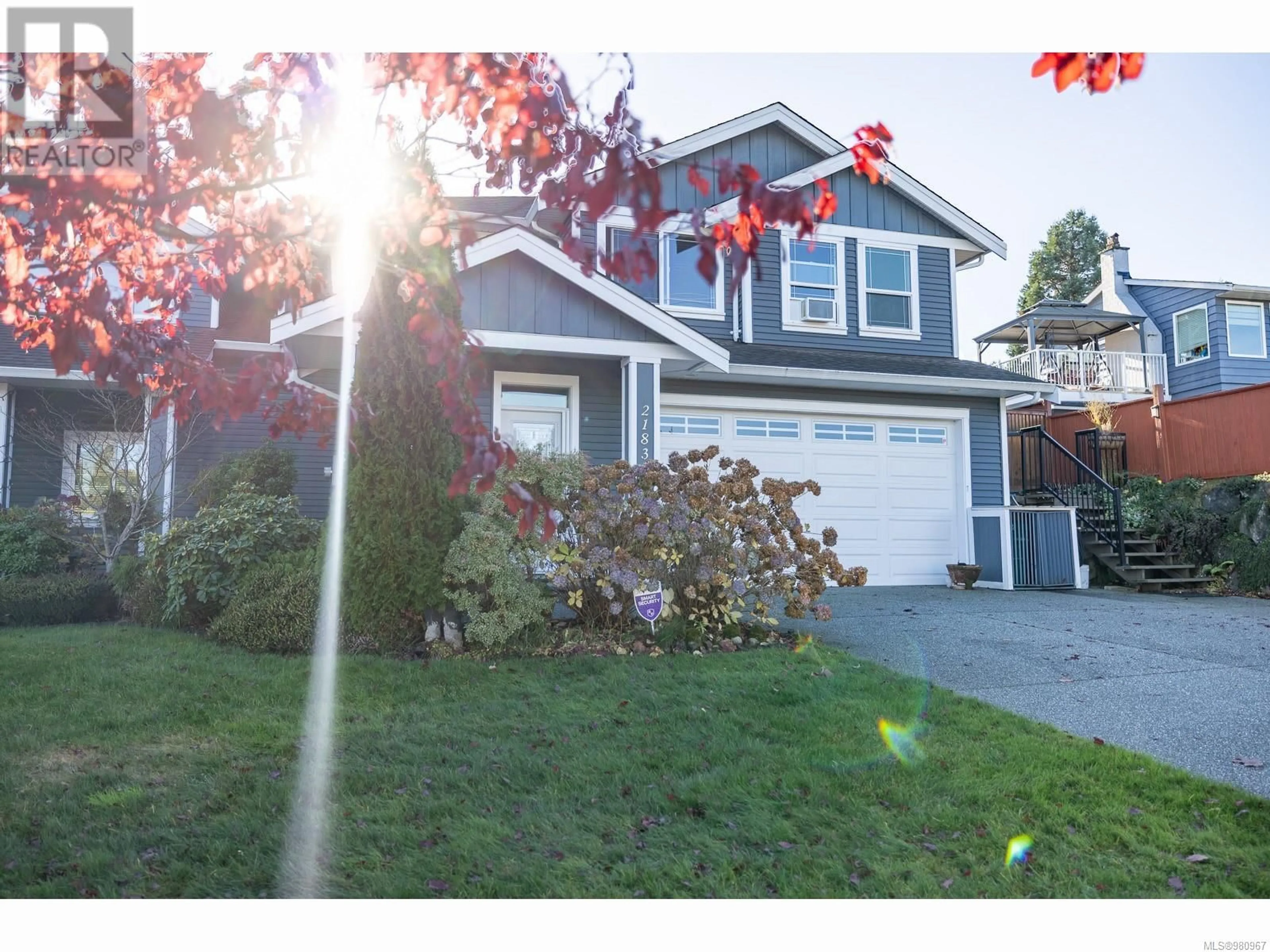 Frontside or backside of a home, the street view for 2183 SALMON Rd, Nanaimo British Columbia V9R6H9