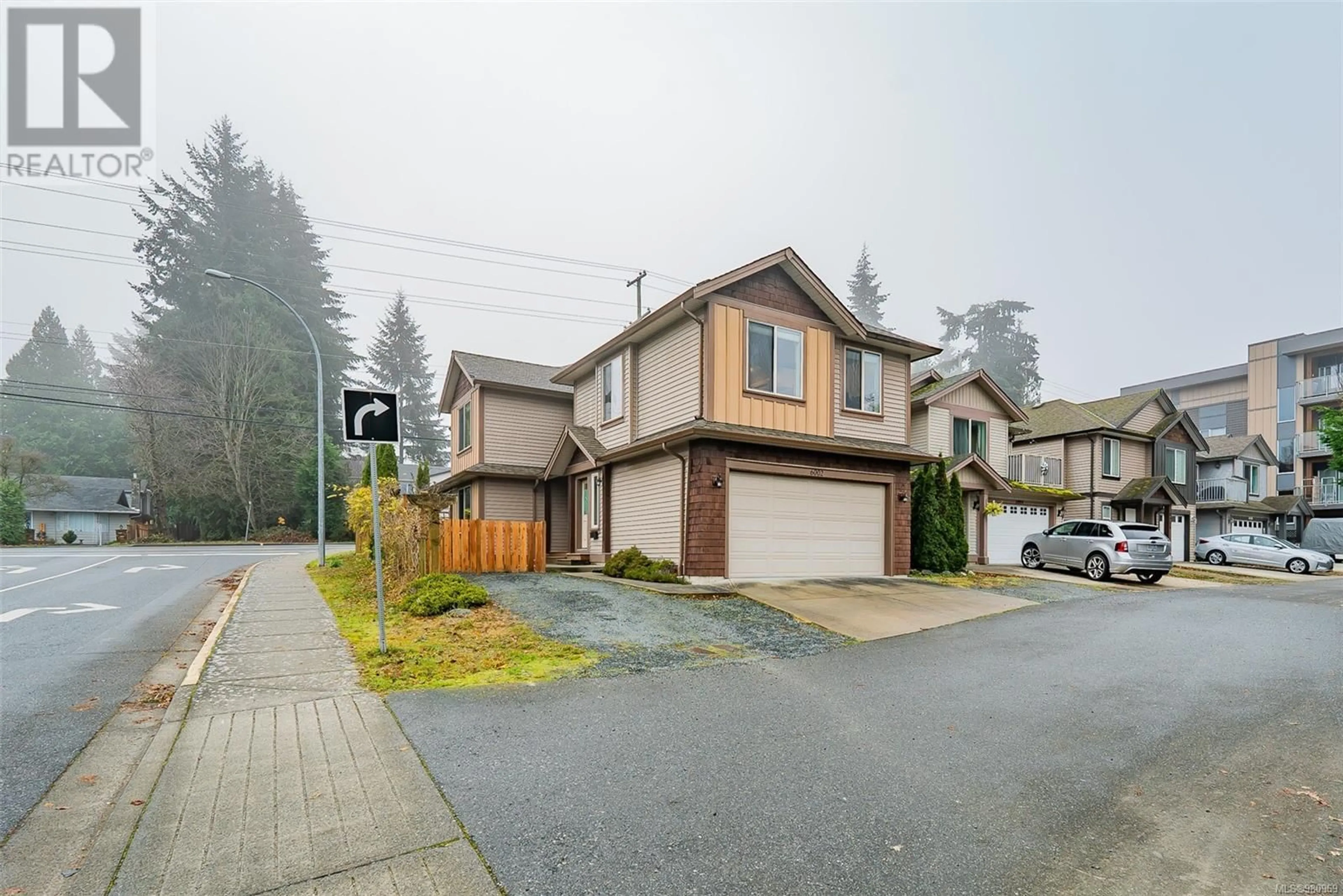 A pic from exterior of the house or condo, the street view for 6002 Hammond Bay Rd, Nanaimo British Columbia V9T5M5