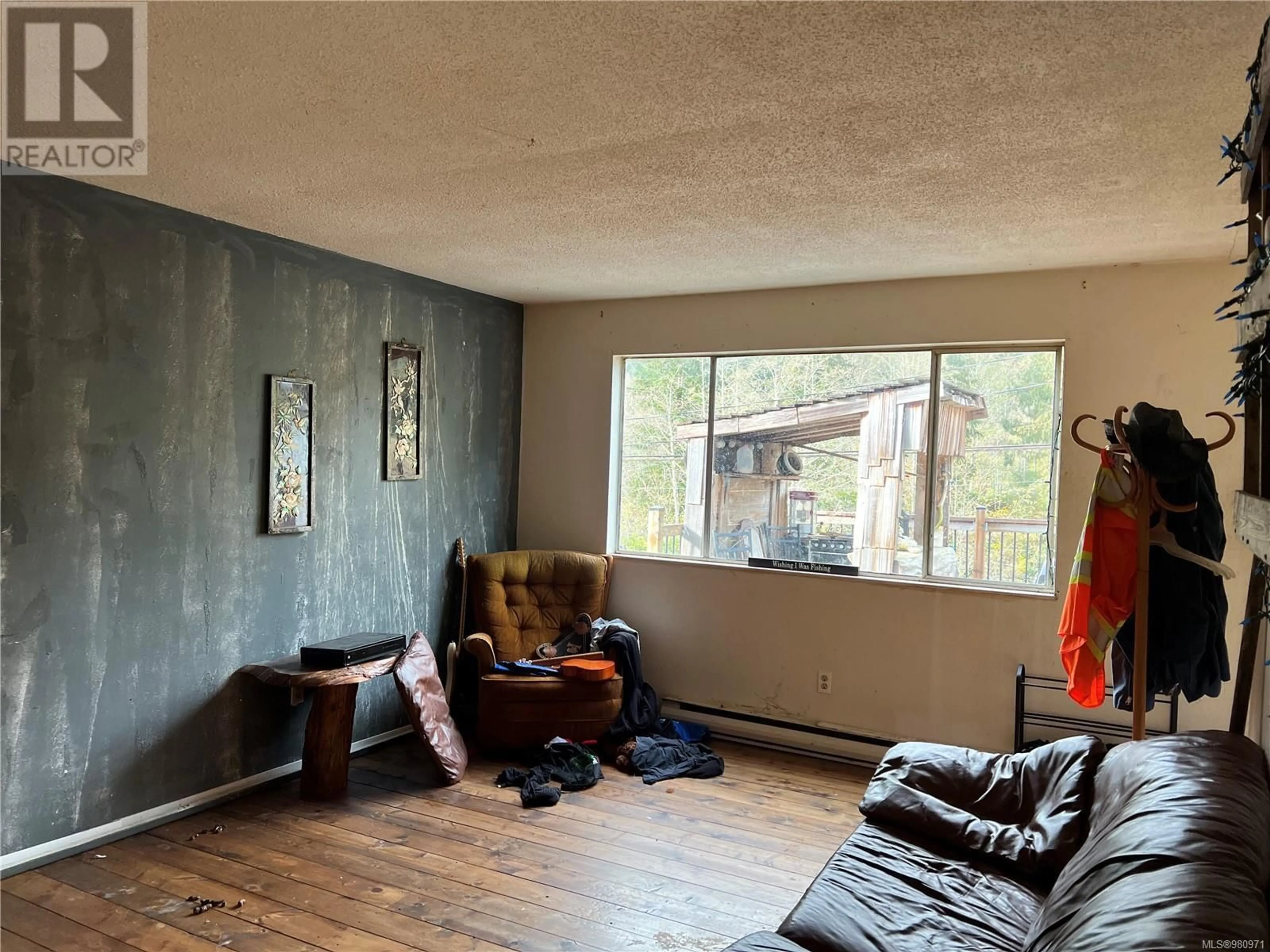 A pic of a room, wood floors for 315 Maquinna Dr N, Tahsis British Columbia V0P1R0