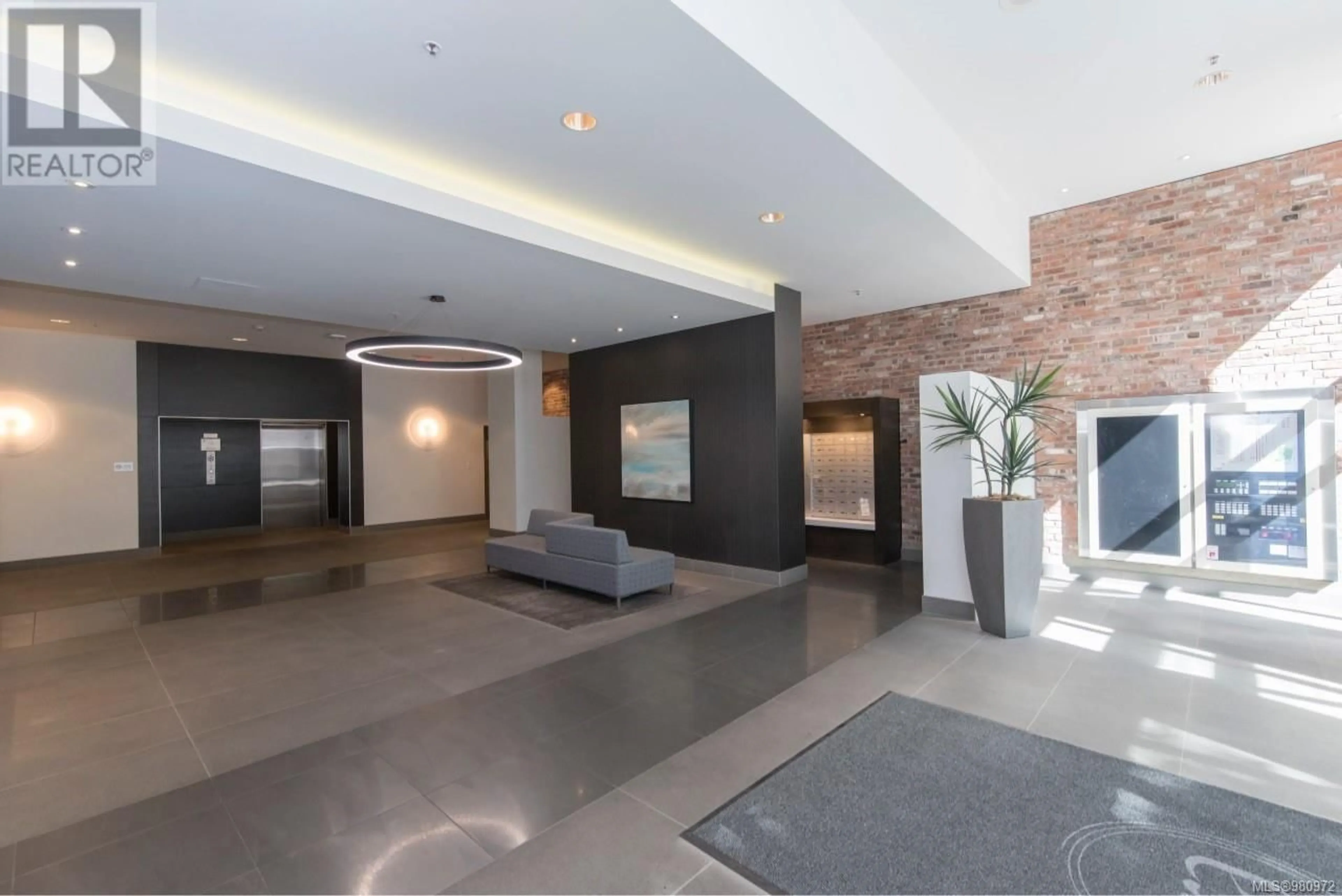 Indoor lobby, cement floor for 1402 728 Yates St, Victoria British Columbia V8W1L4